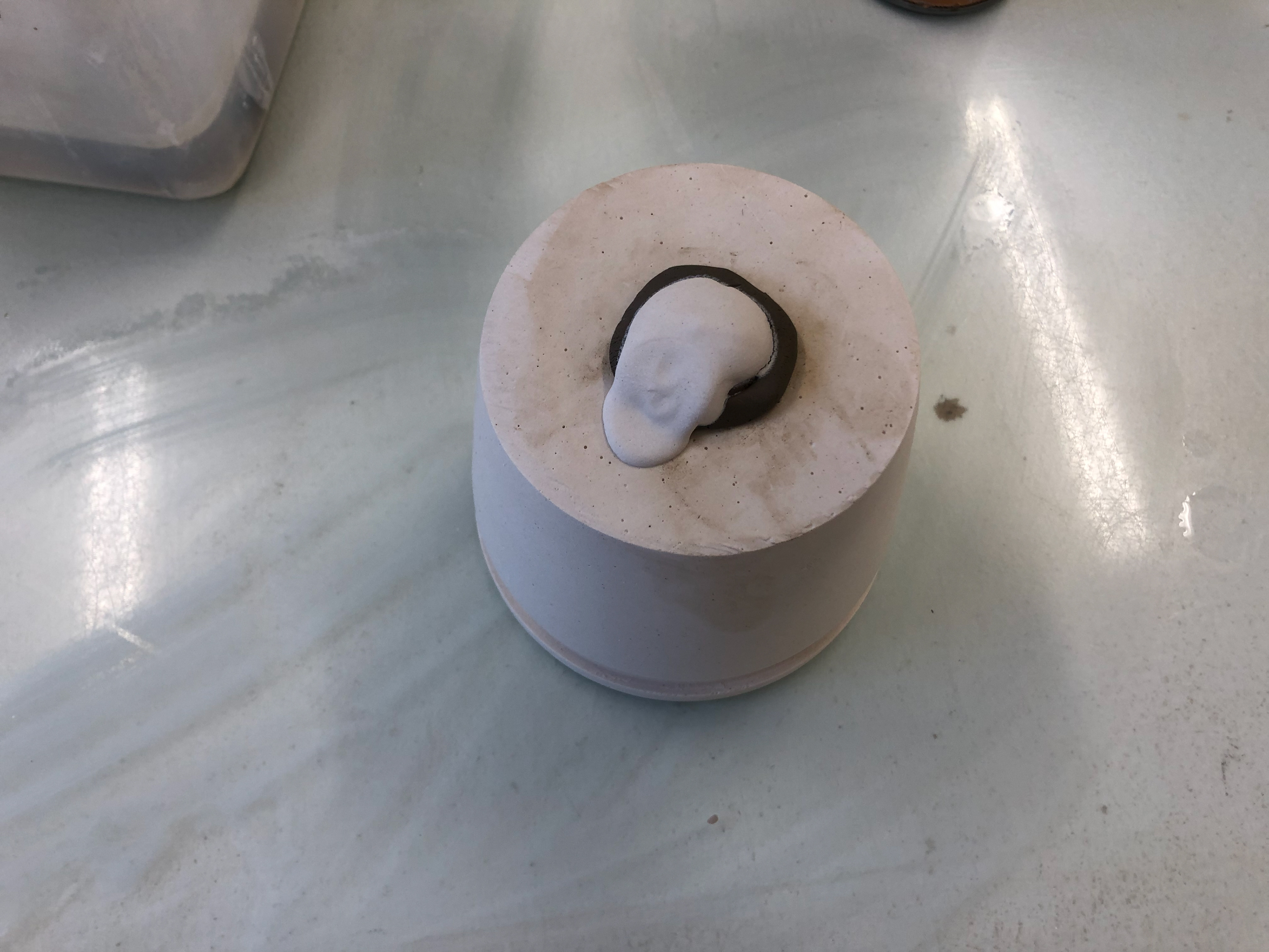Filling the hole where the mandrel was.