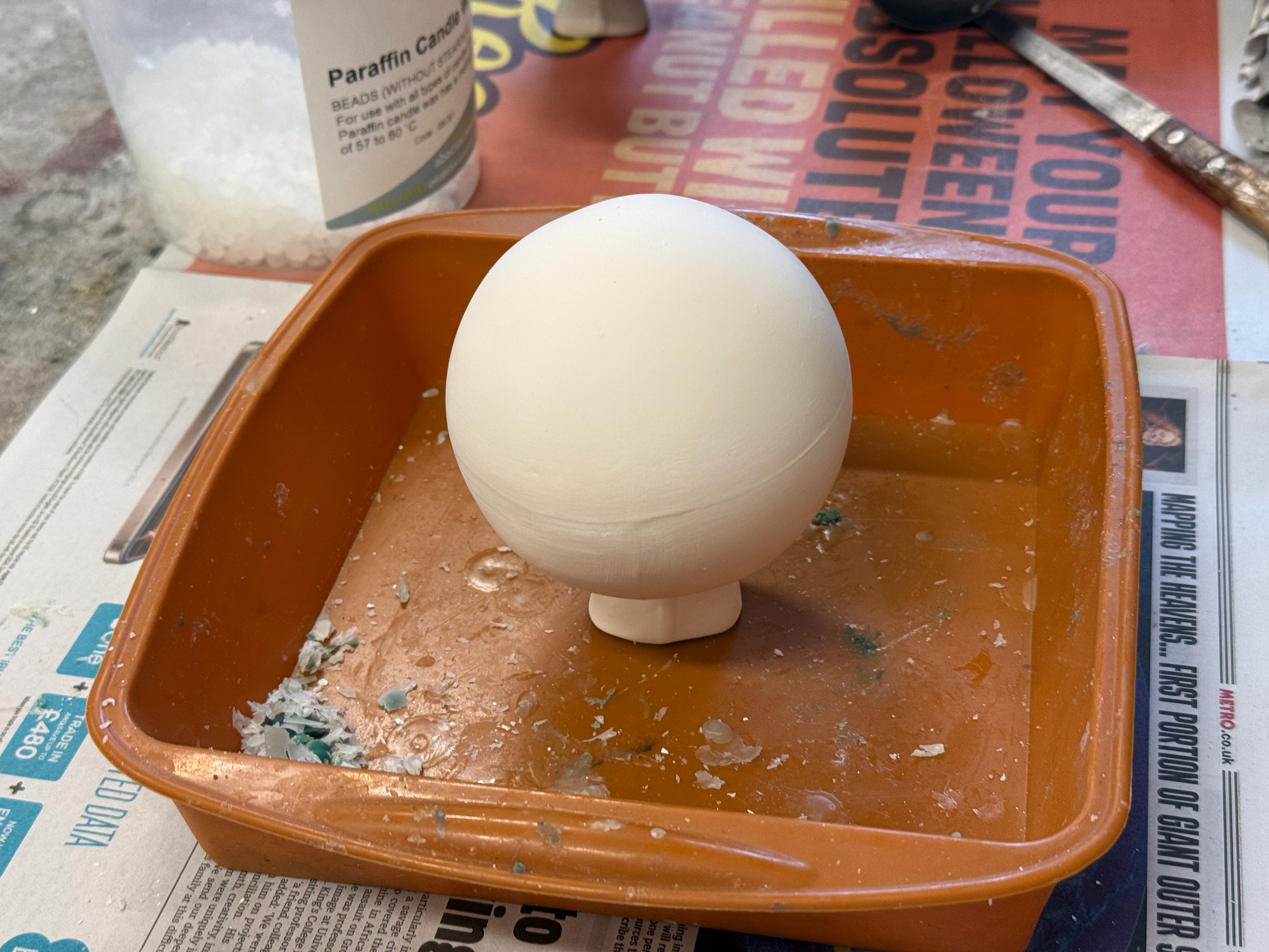 Object ready to have wax poured over it.