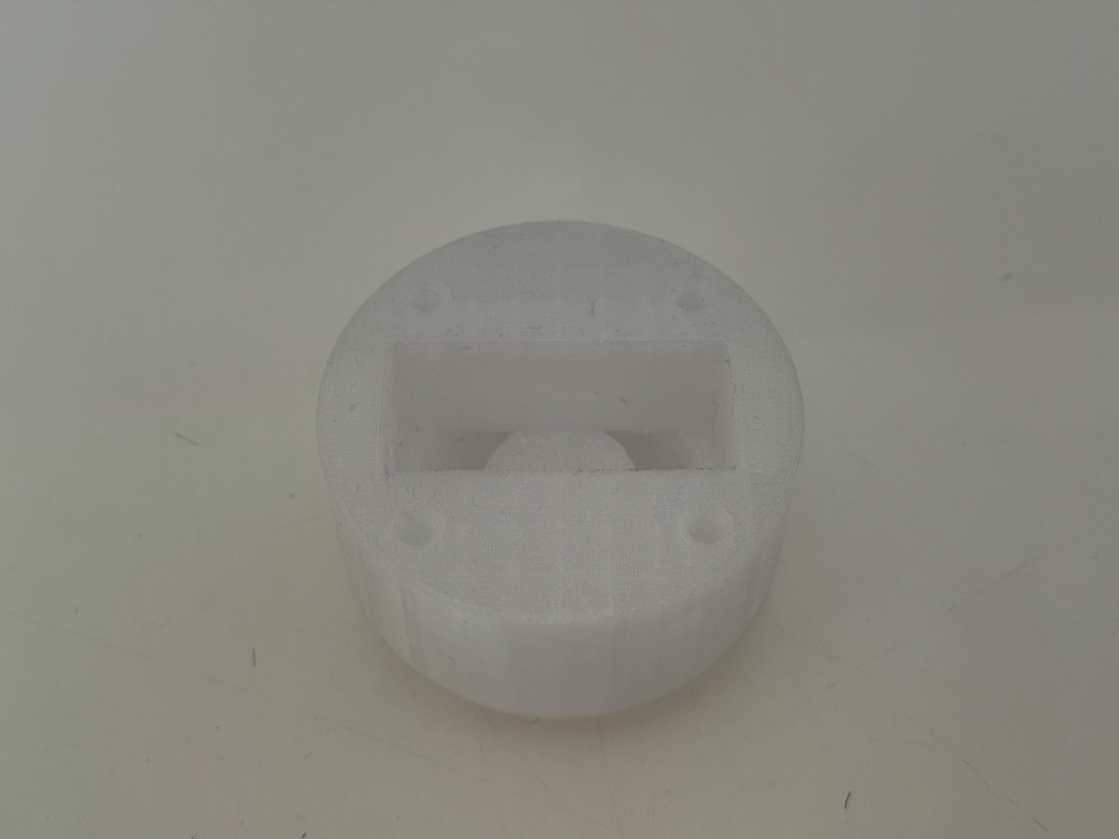 You can see the screw section sits directly onto of the hole for the Seeeduino
