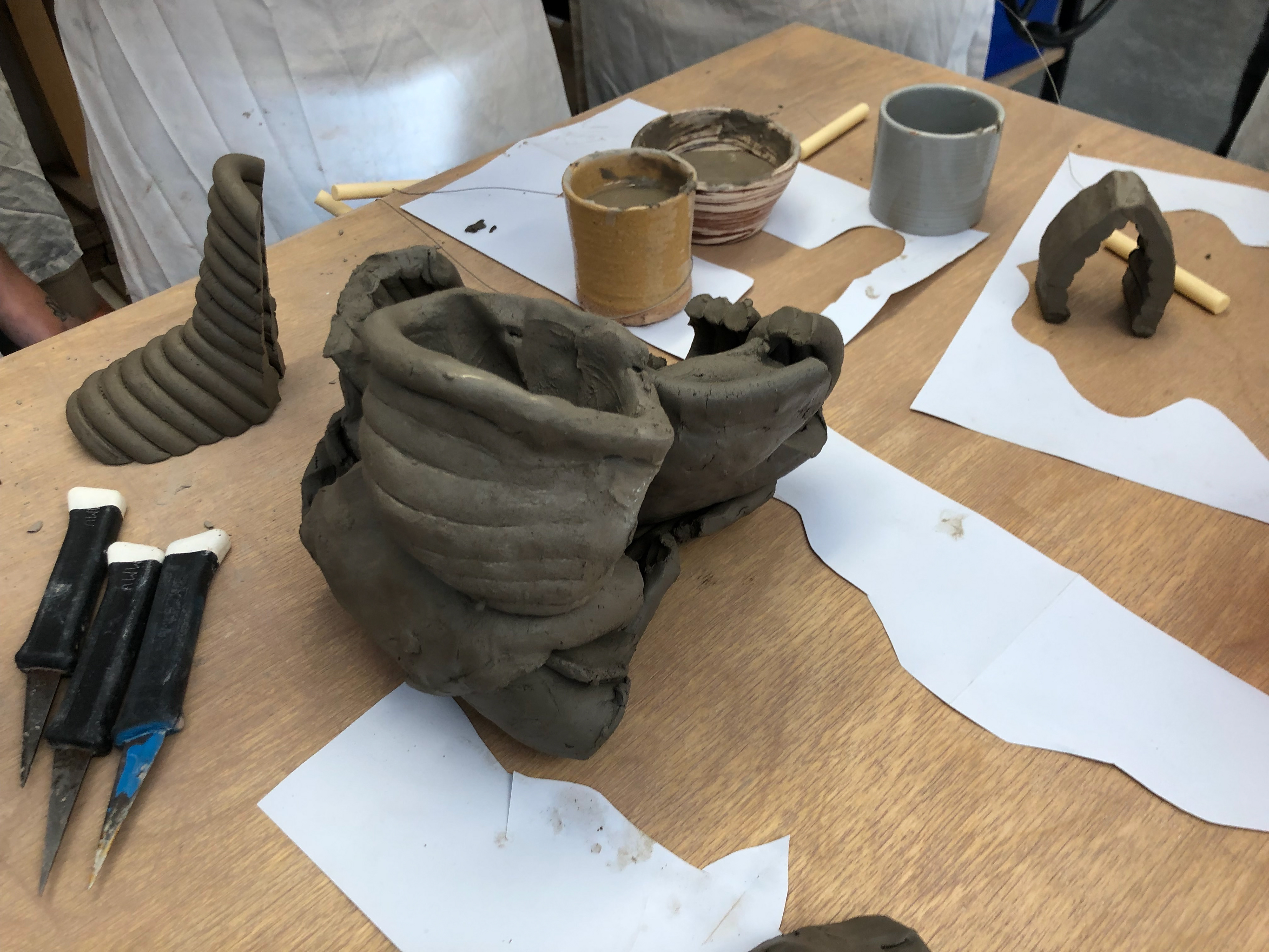 The second "Frankenstein" creation. We used the word associated with each vessel and placed the clay on taking into account the words meaning.