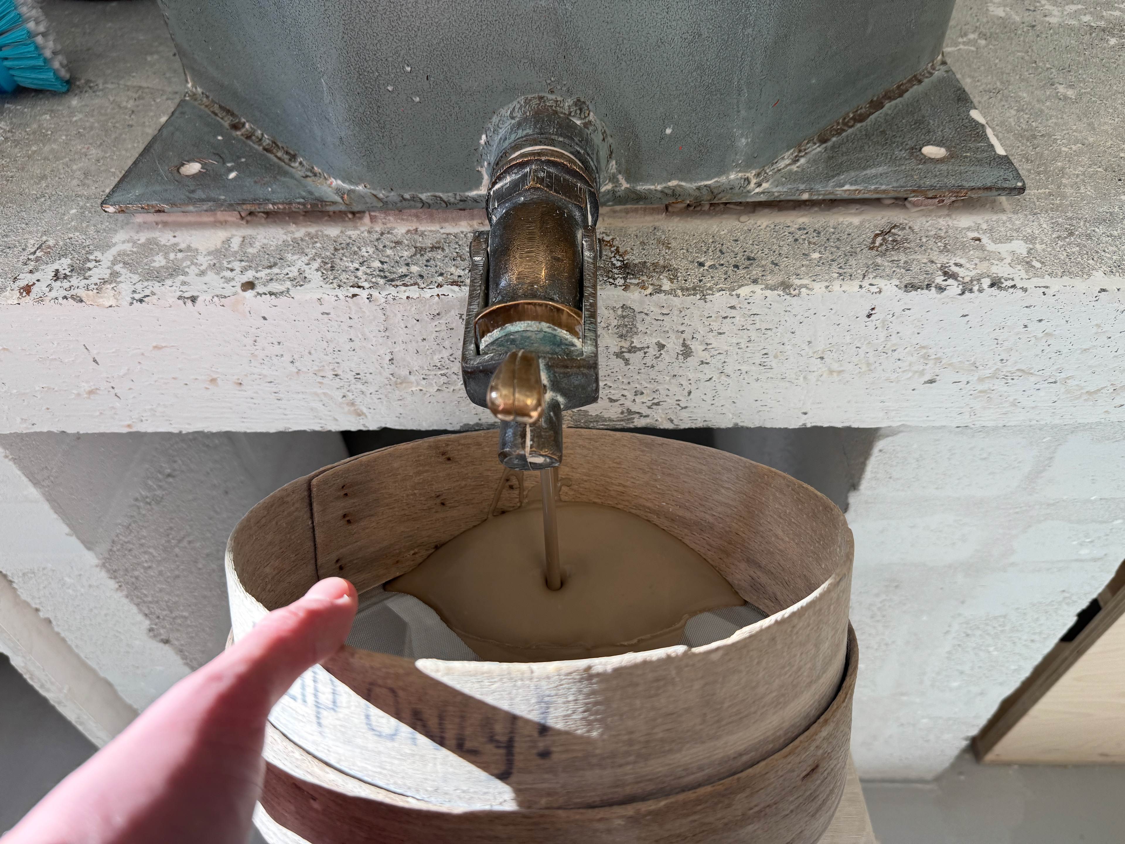 Slip into sieve into container.