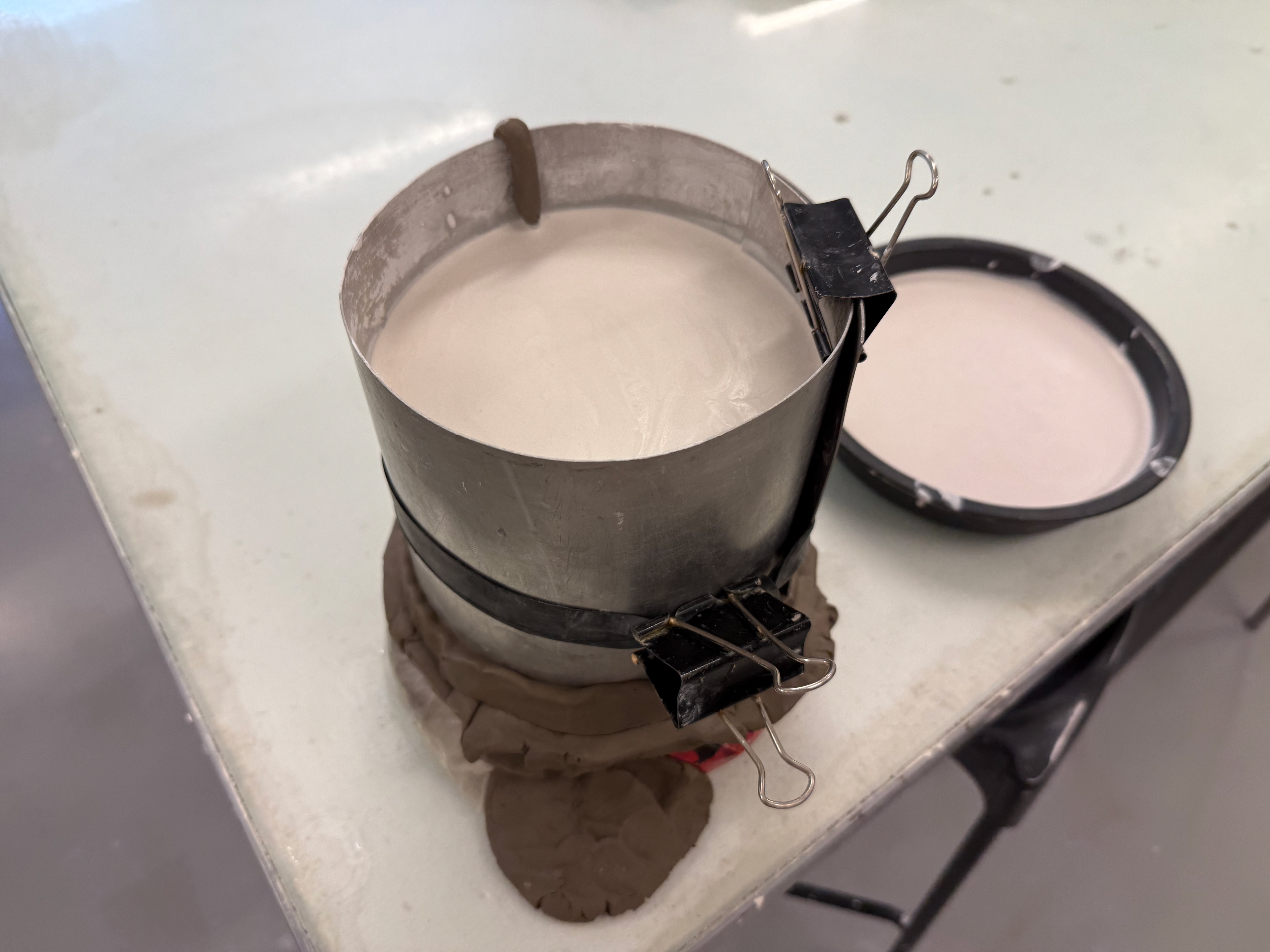 Plaster setting with excess to the side.