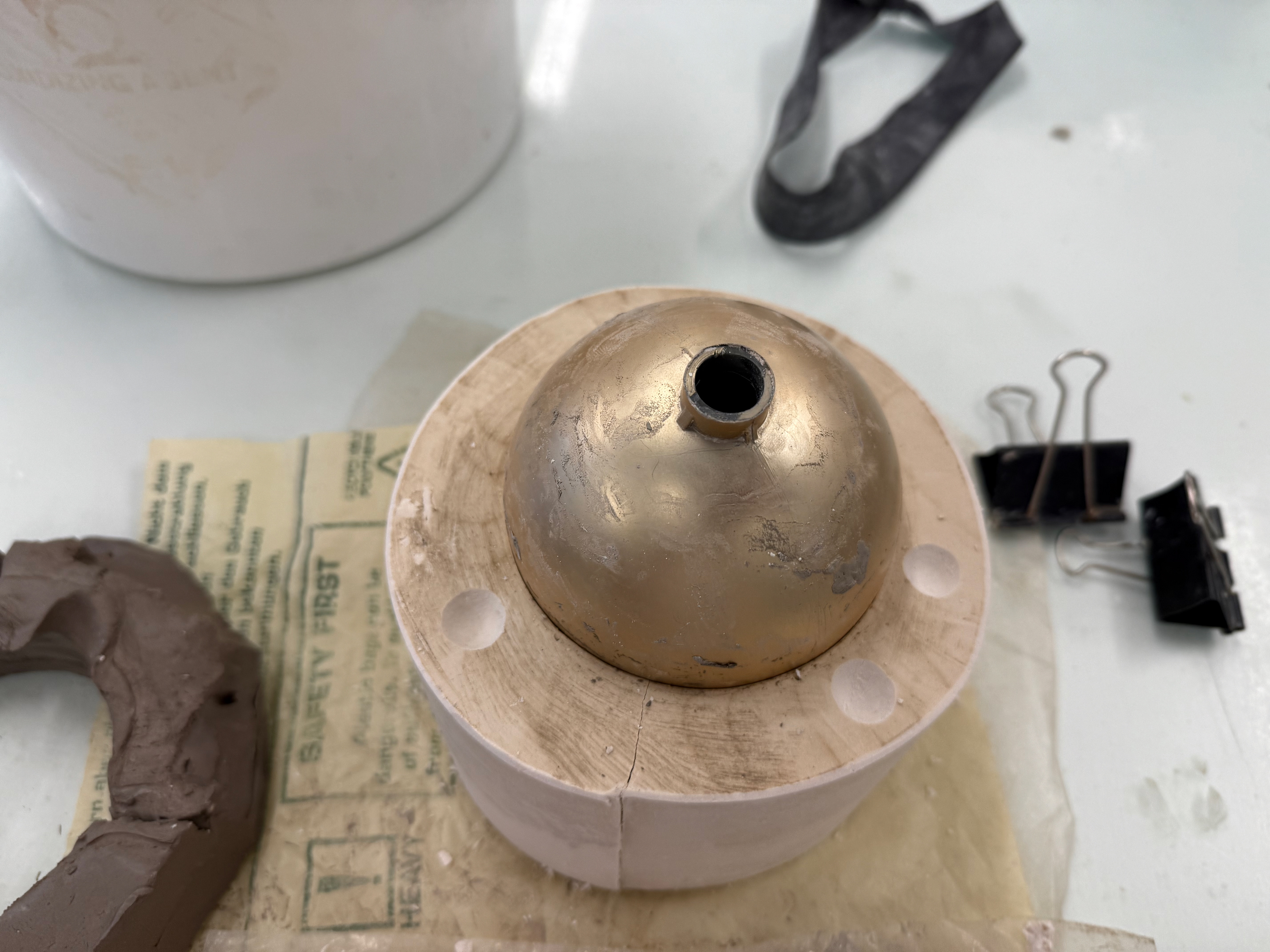 I used a spoon to carve out holes so all the pieces could securely fit together.