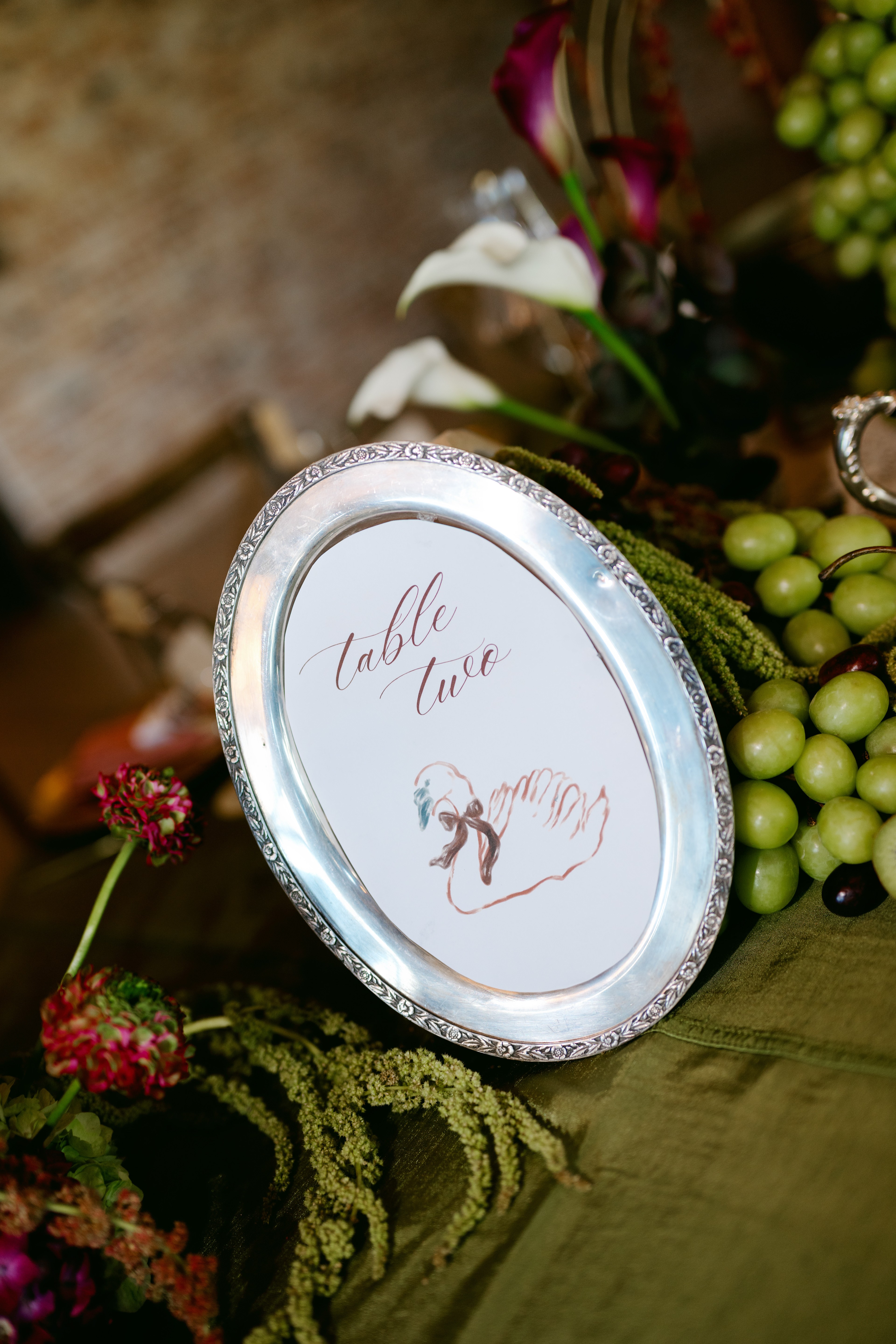 table number with swan illustration