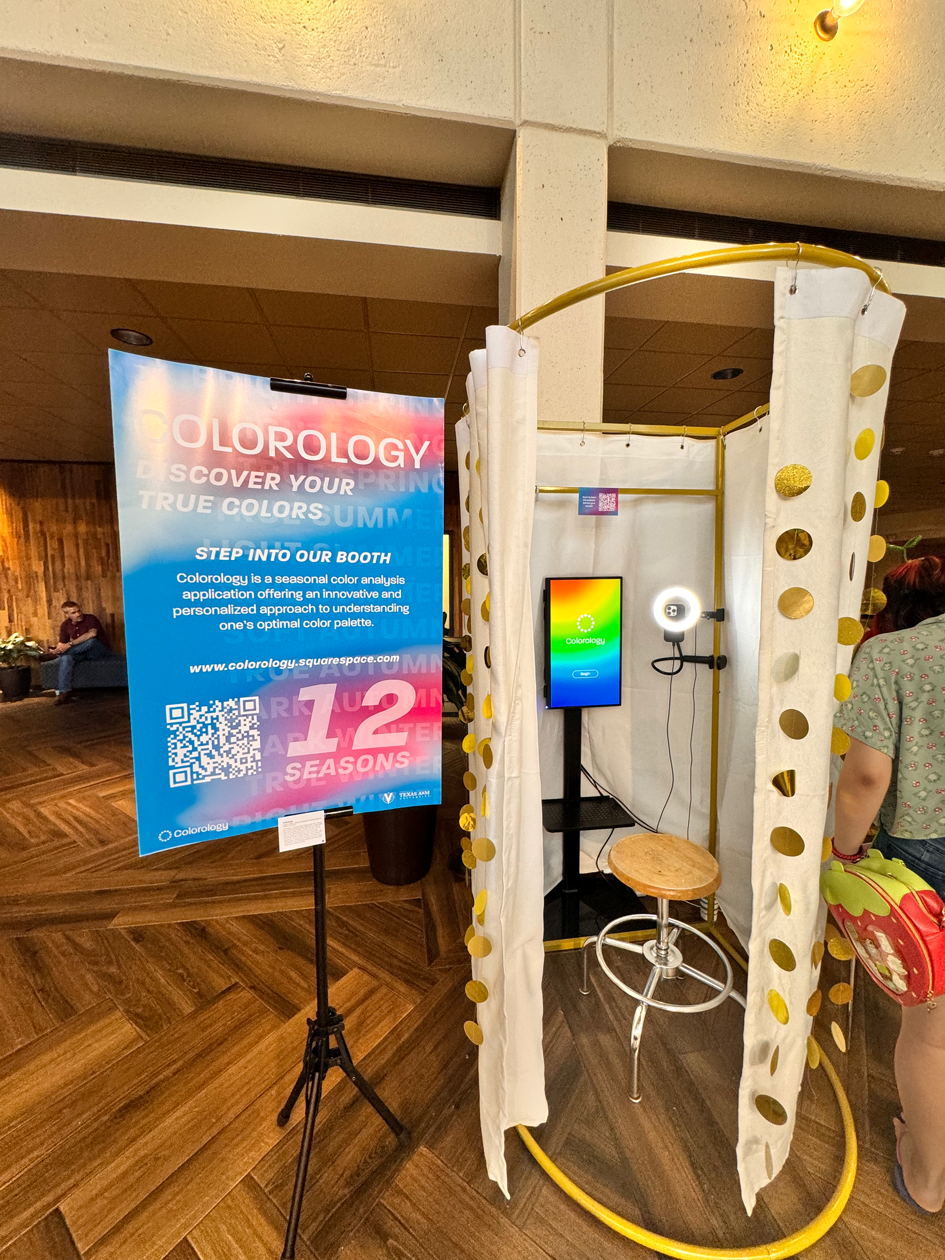 promotional poster and booth setup