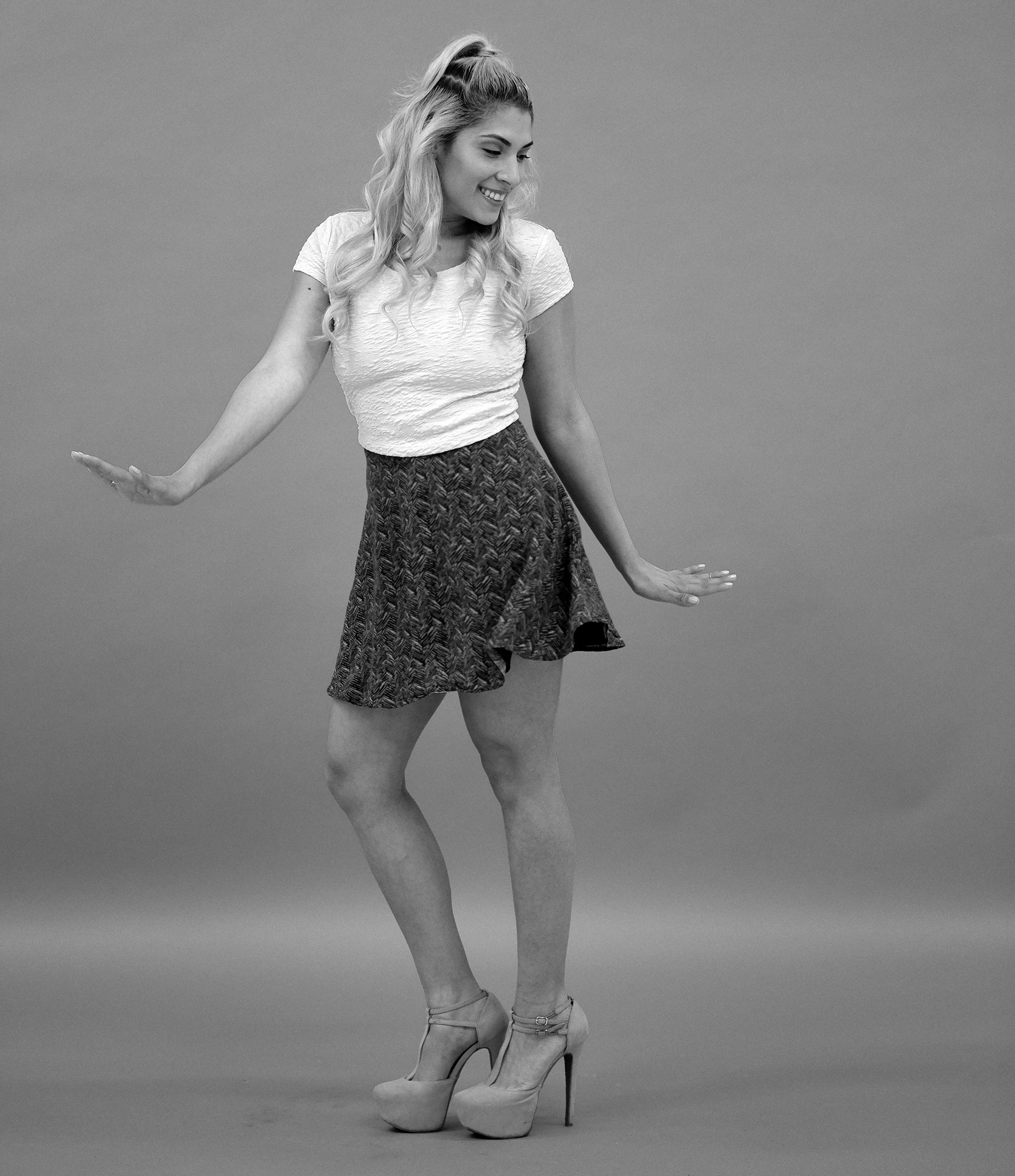 Fun black and white image of Adriana dancing