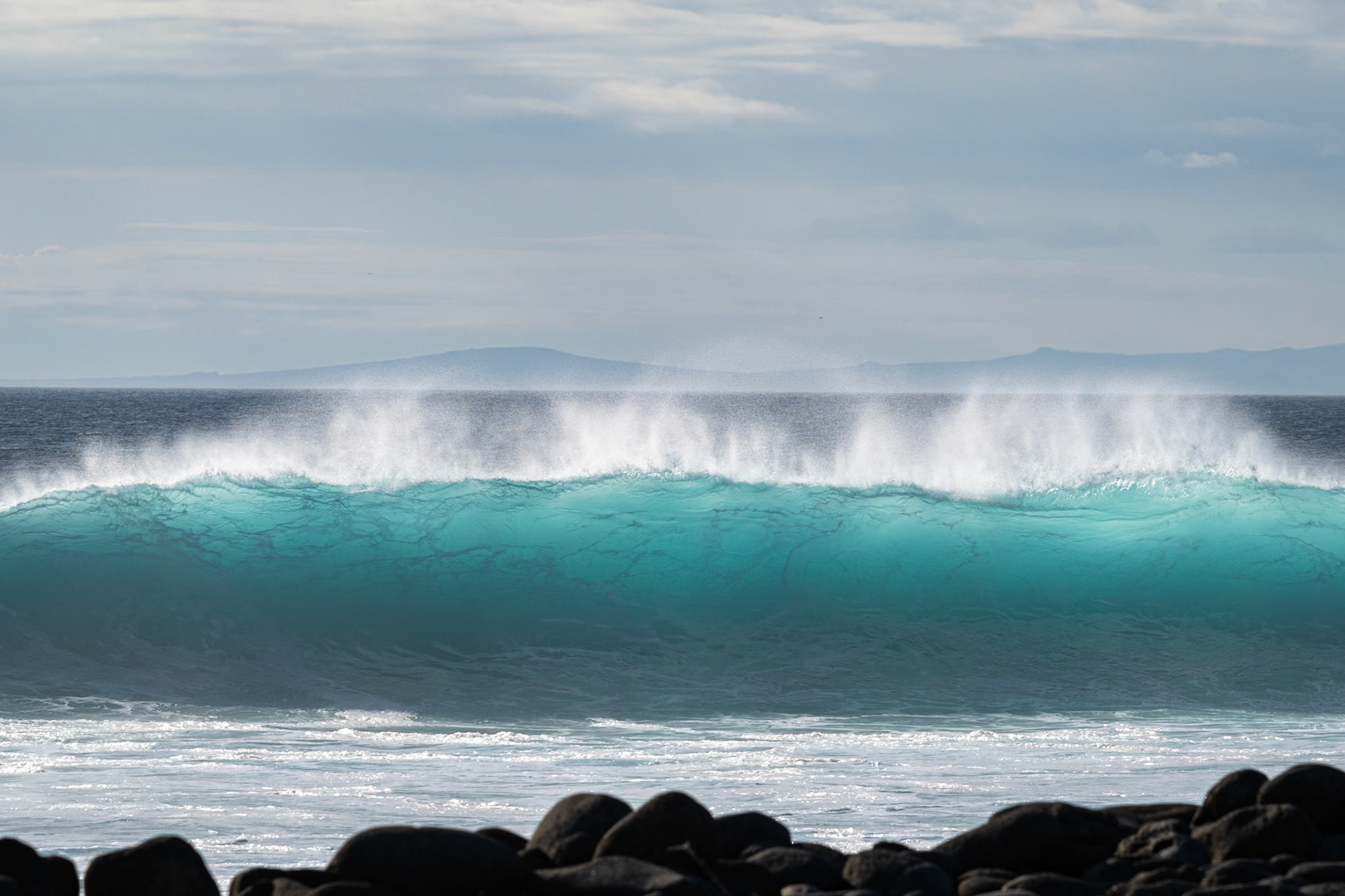 turquoise wave and white spray