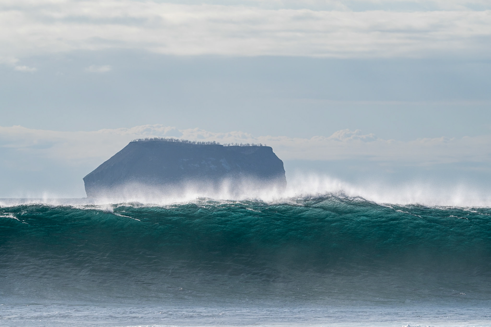 turquoise waves and island