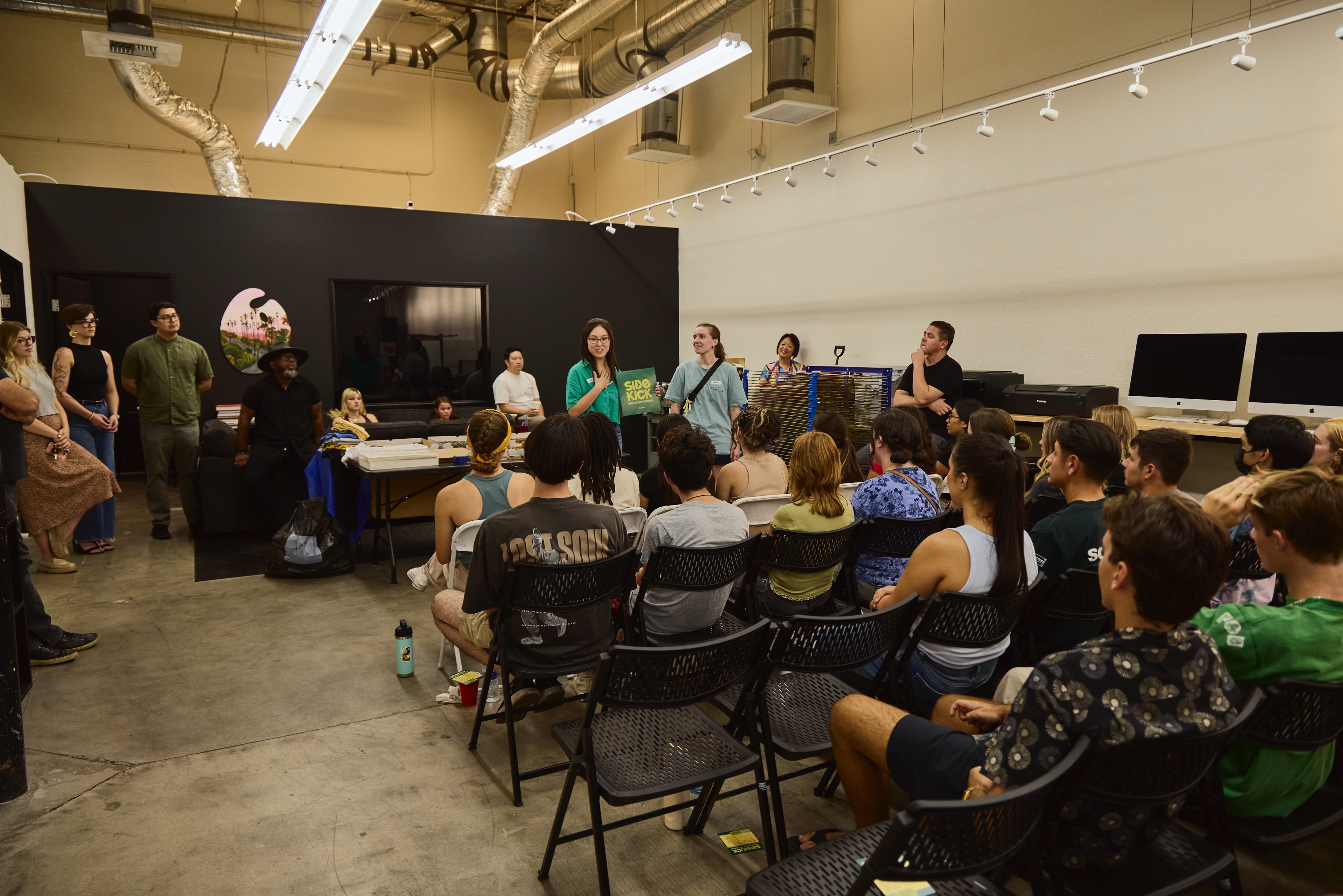 SIDEKICK Mentorship Leads introducing the program to Graphic Design students
