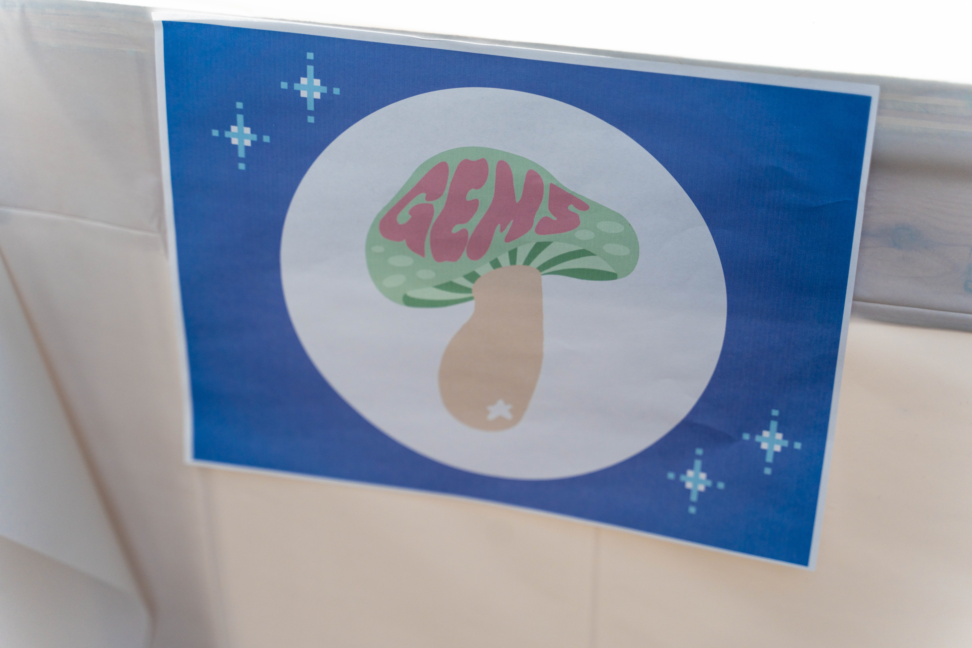 Close-up of table signs customized for each vendor logo. Photo by Jaye Huynh.
