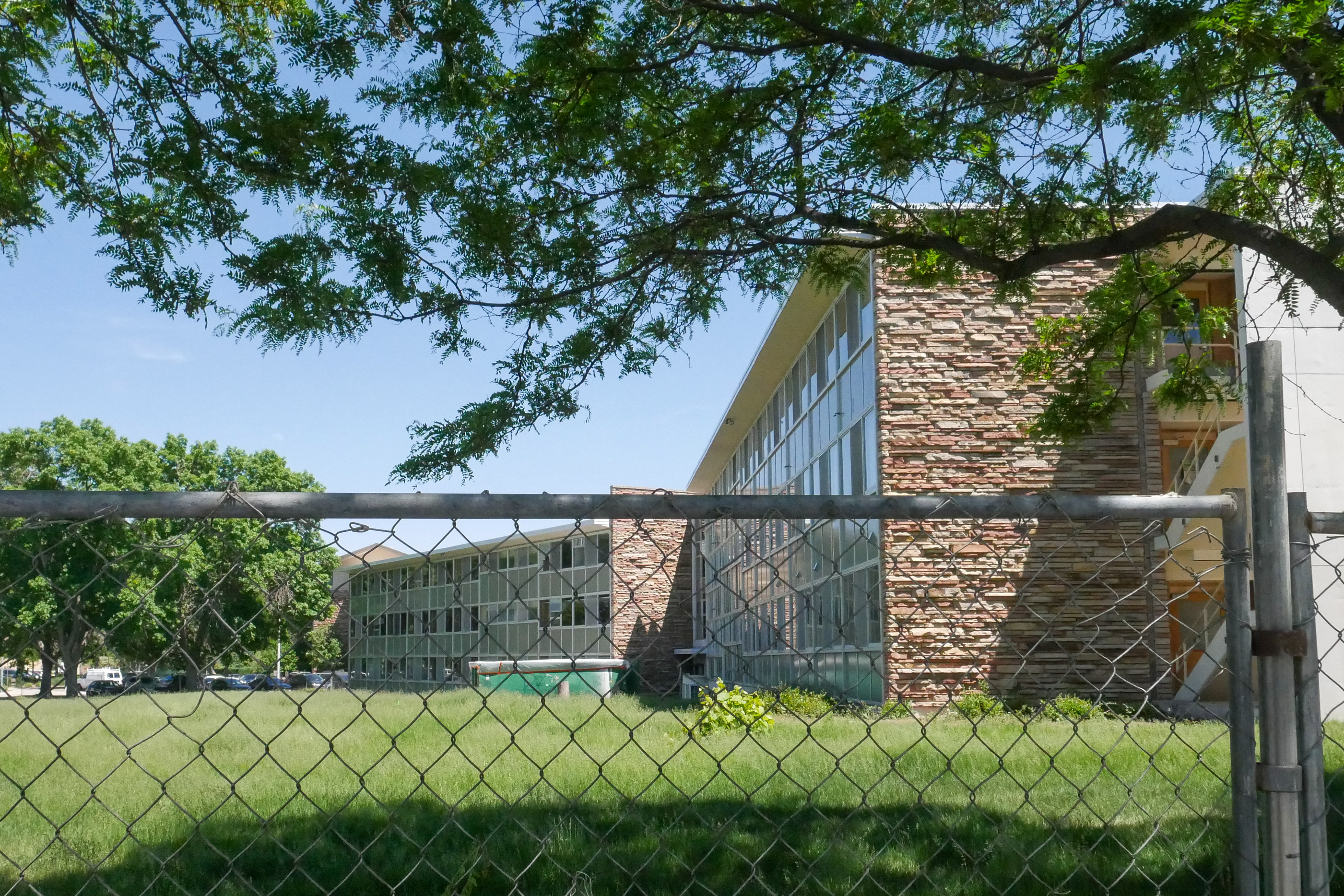 Fences surround the north-facing facade