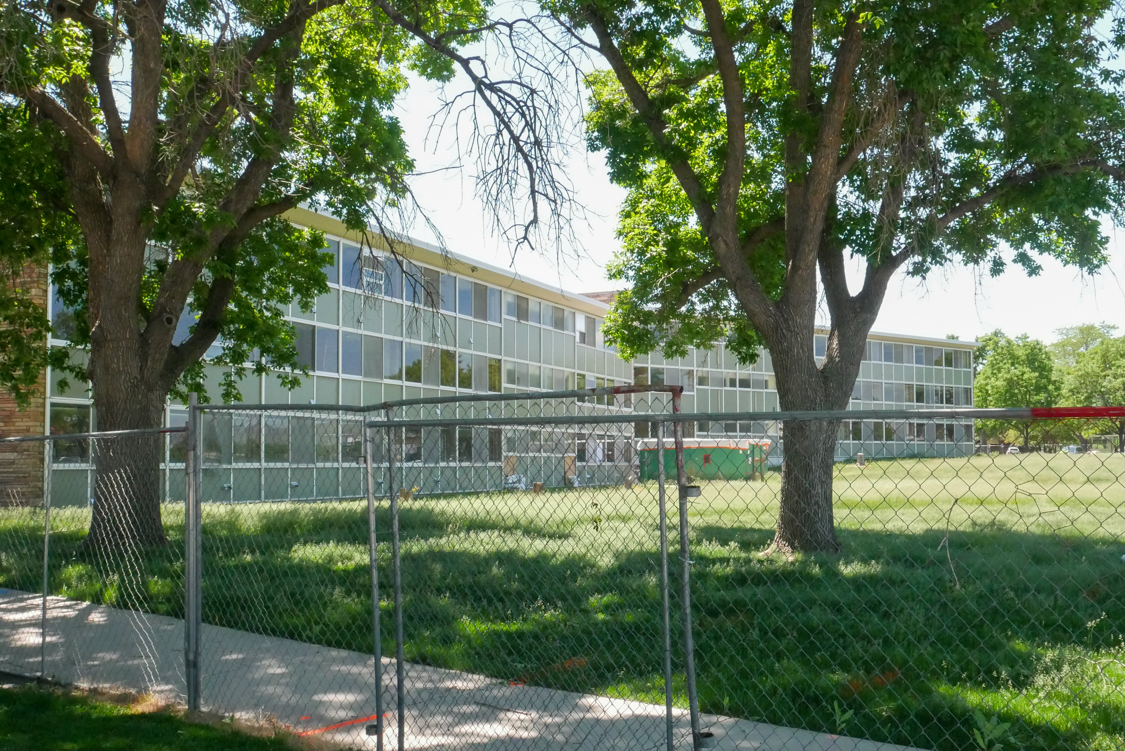Fences surround the north-facing facade