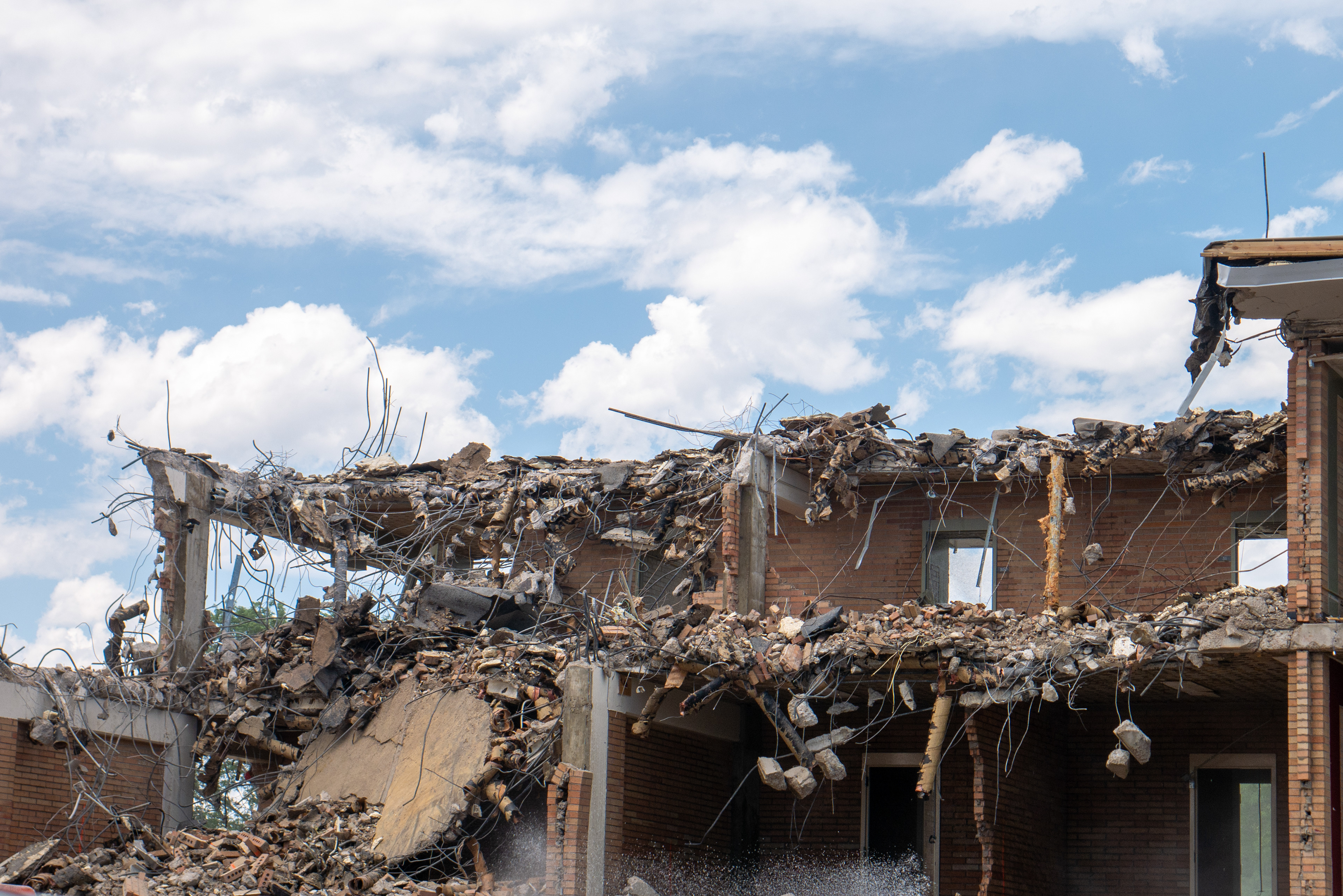 Partial demolition of the NE wing, south-facing side