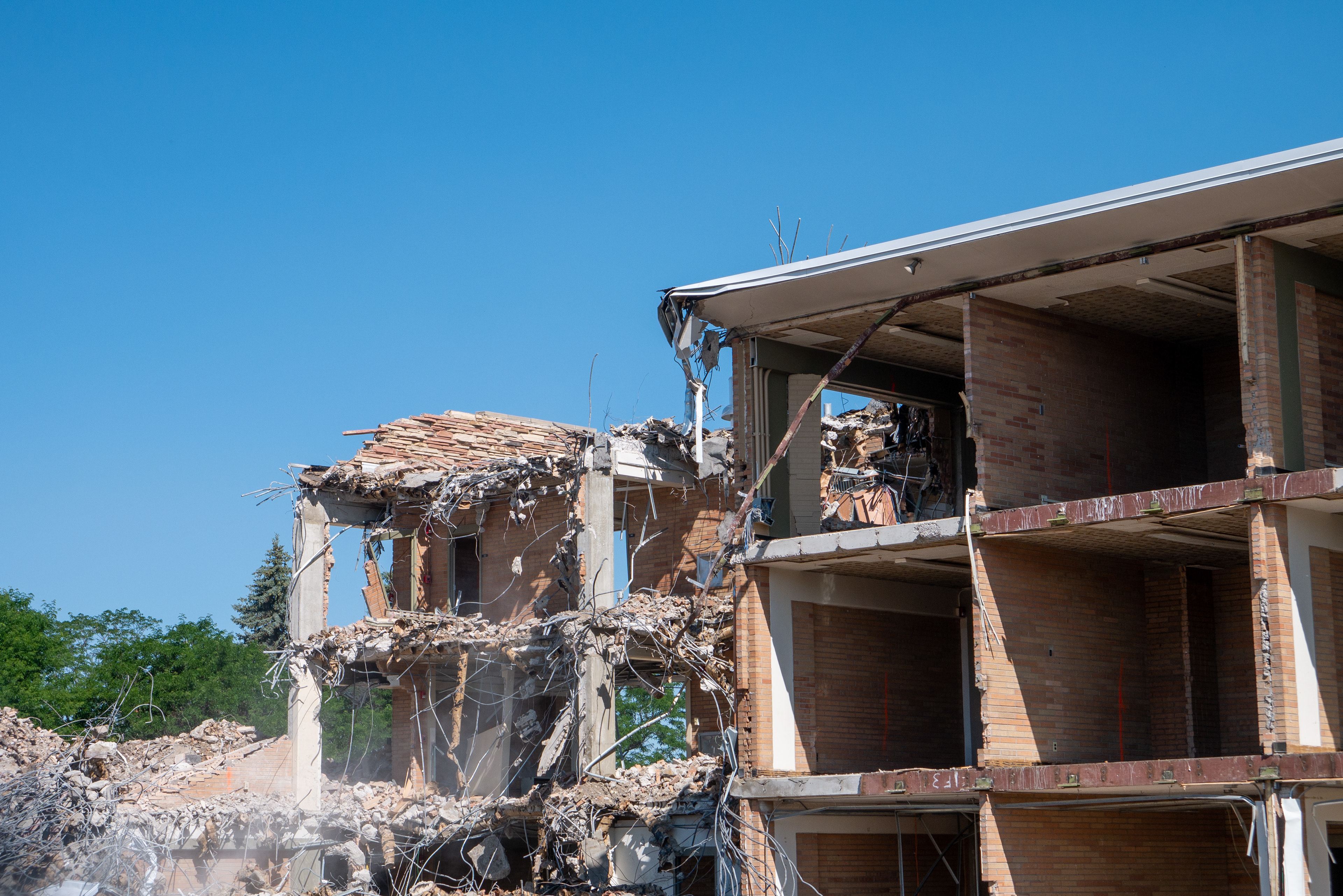 Partial demolition of the NE wing, south-facing side