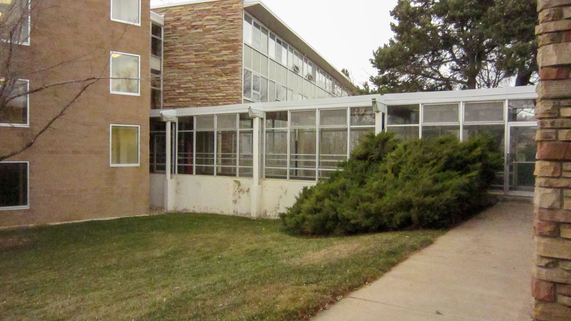 East-facing side of the south glass hallway and elevator of SE wing