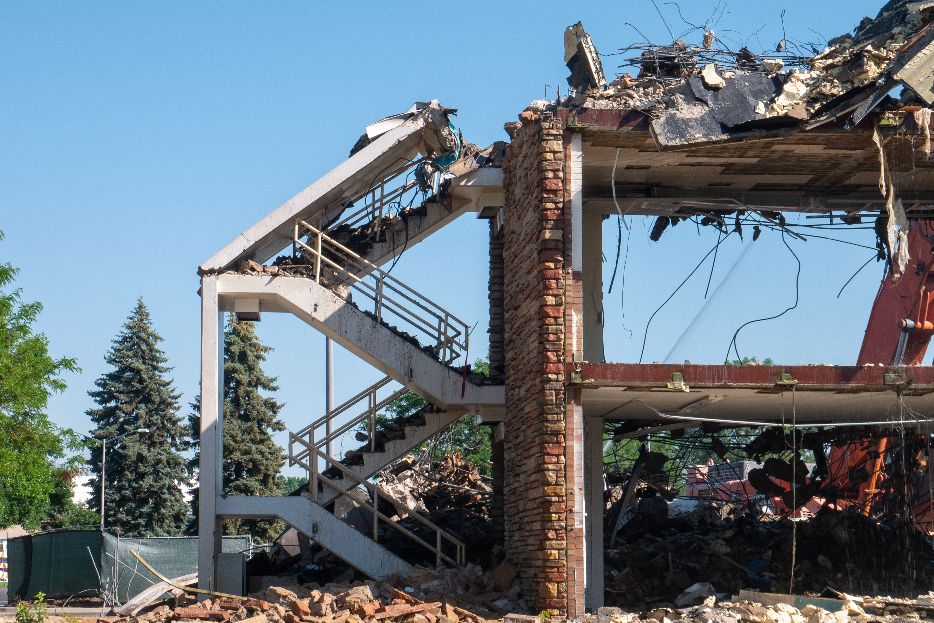 Demolition of the SW stairwell, south-facing side