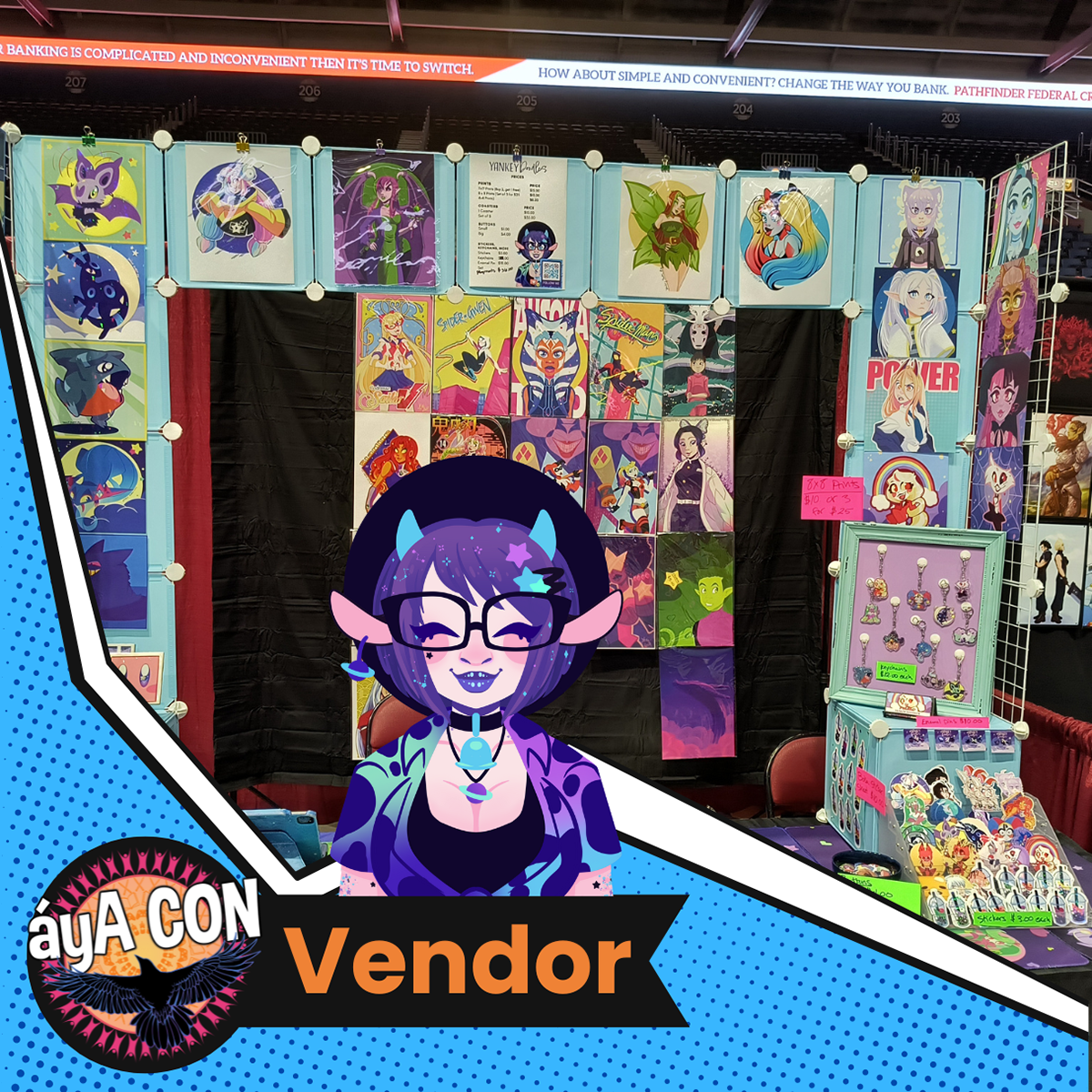 My artist alley booth featuring my artwork