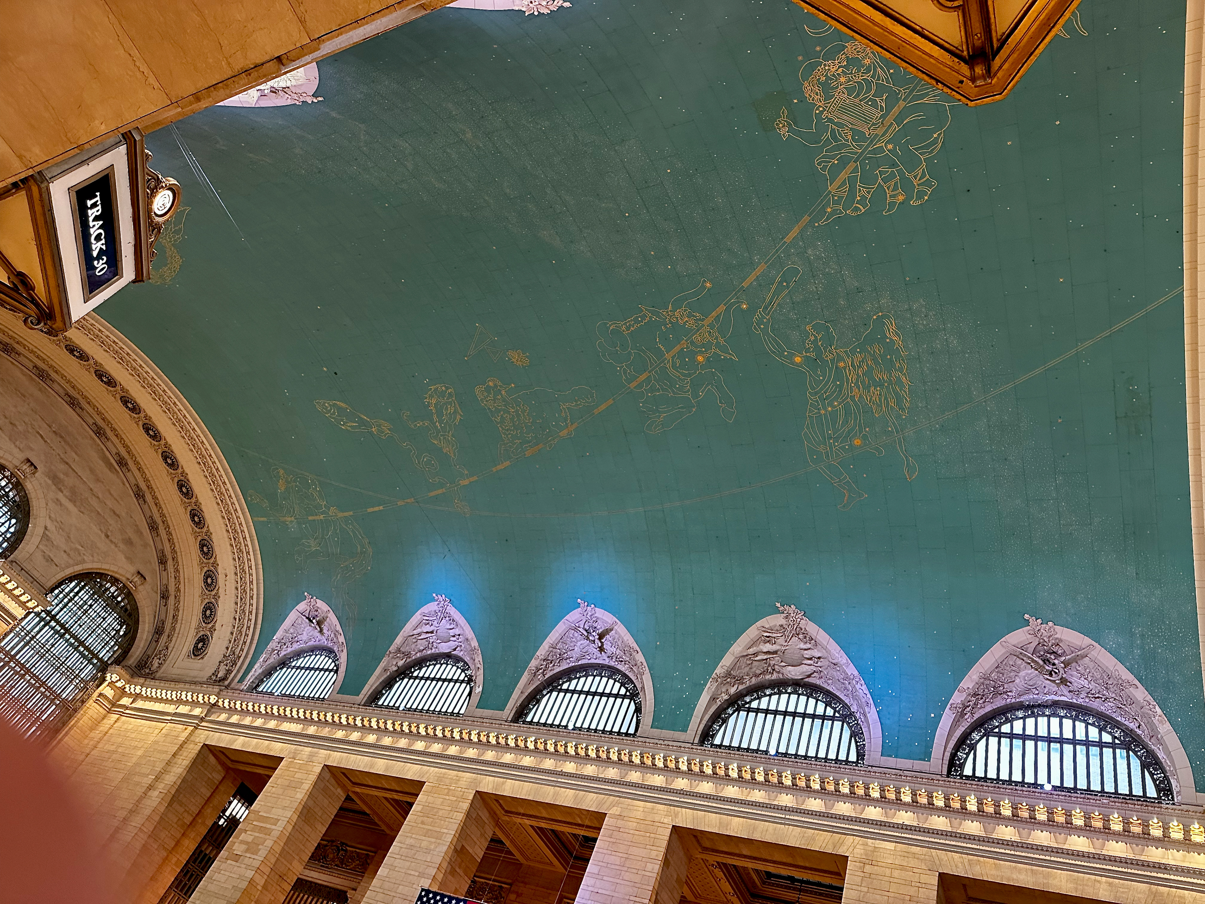 I don't recall ever seeing this in all the many pictures of Grand Central. The ceiling is the Zodiac.