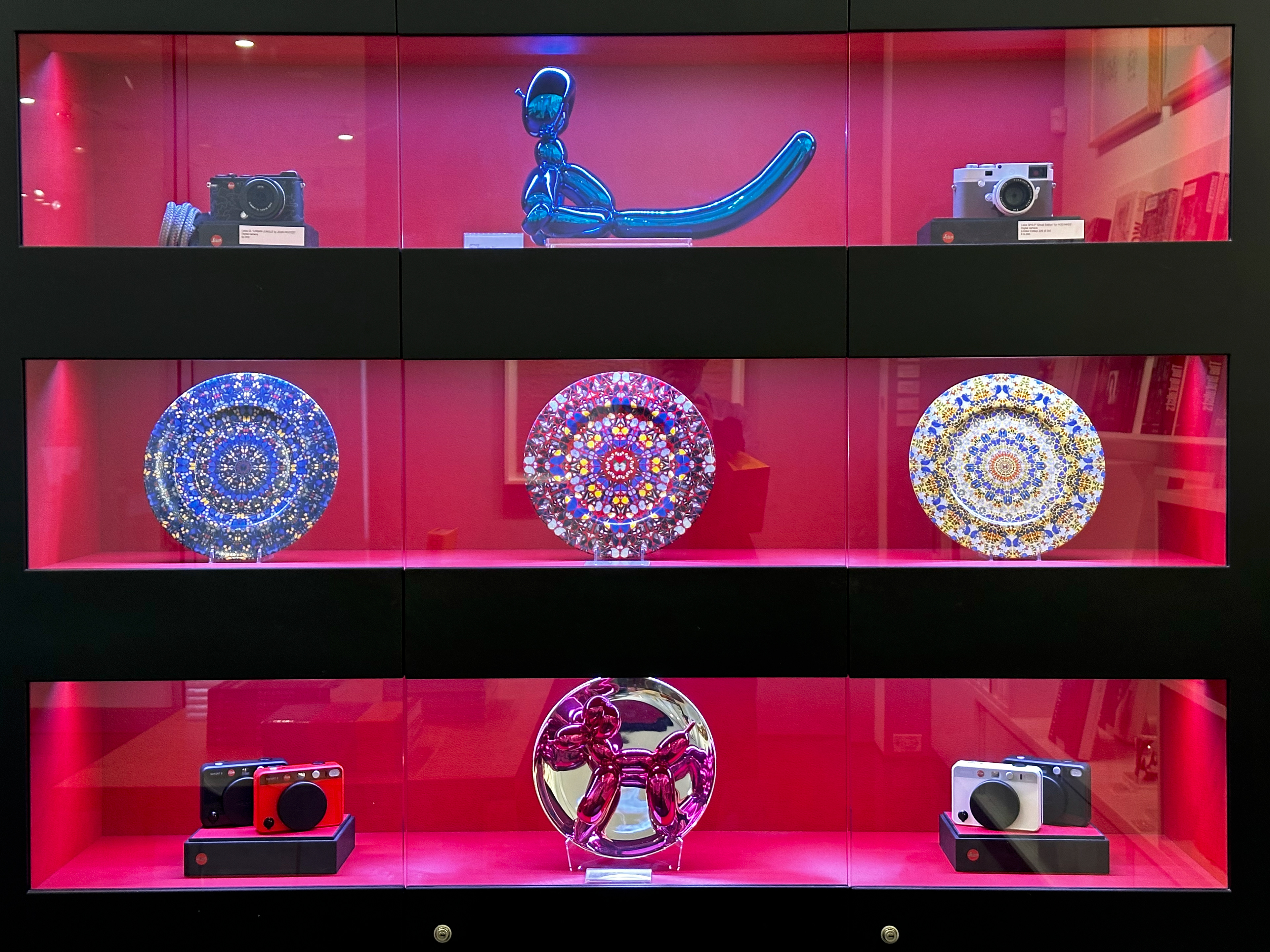 ..., expensive cameras, and Jeff Koons sculptures. (I presume these are authentic.)