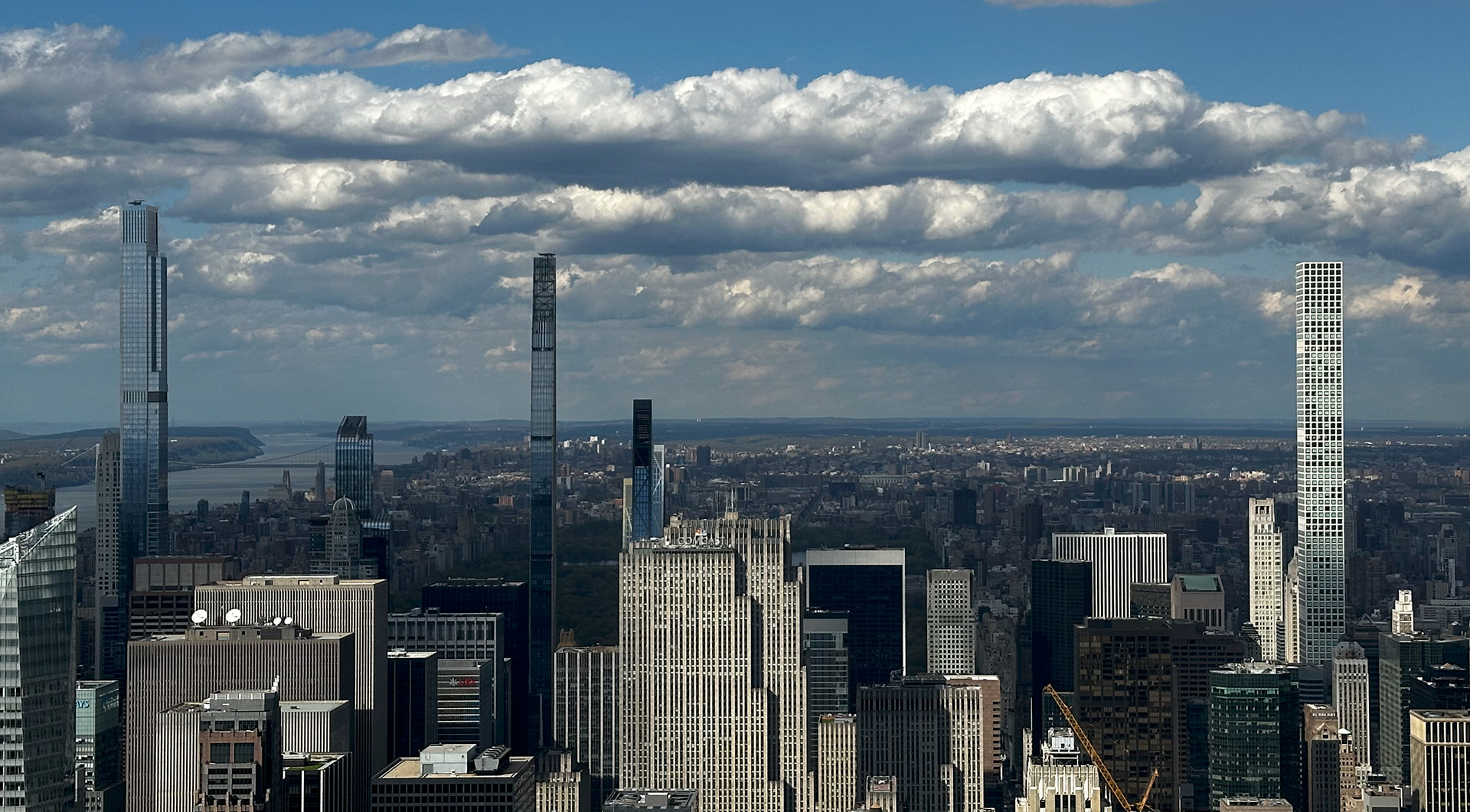 The three tall building are the ones we saw at 432 Park and 58th street. They are Much taller than where I'm viewing from: the 86th floor of the Empire State Building.