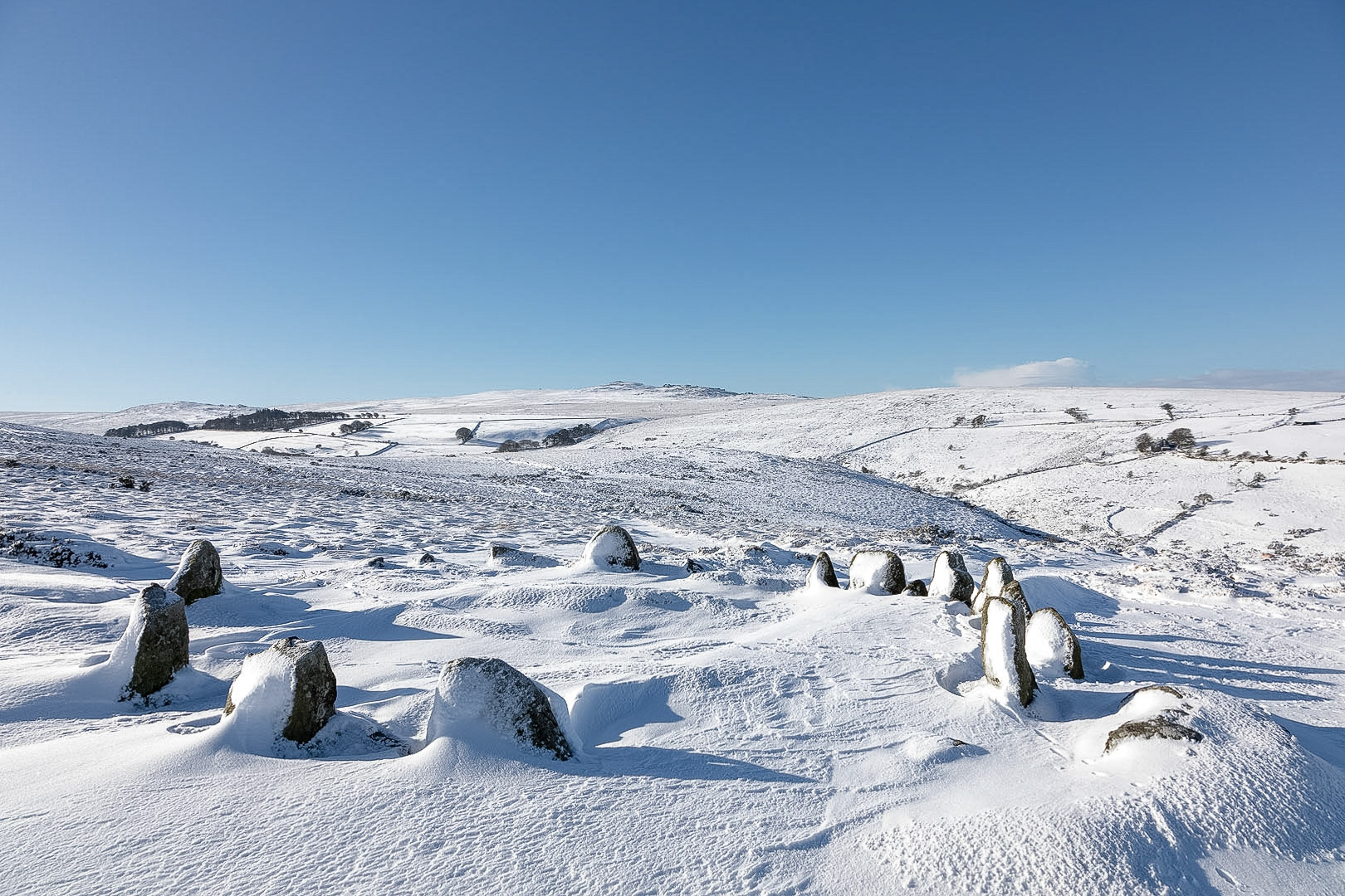 The nine maidens stone circle on Dartmoor, jmust outsiode the village of Belstone, in fresh winter snow