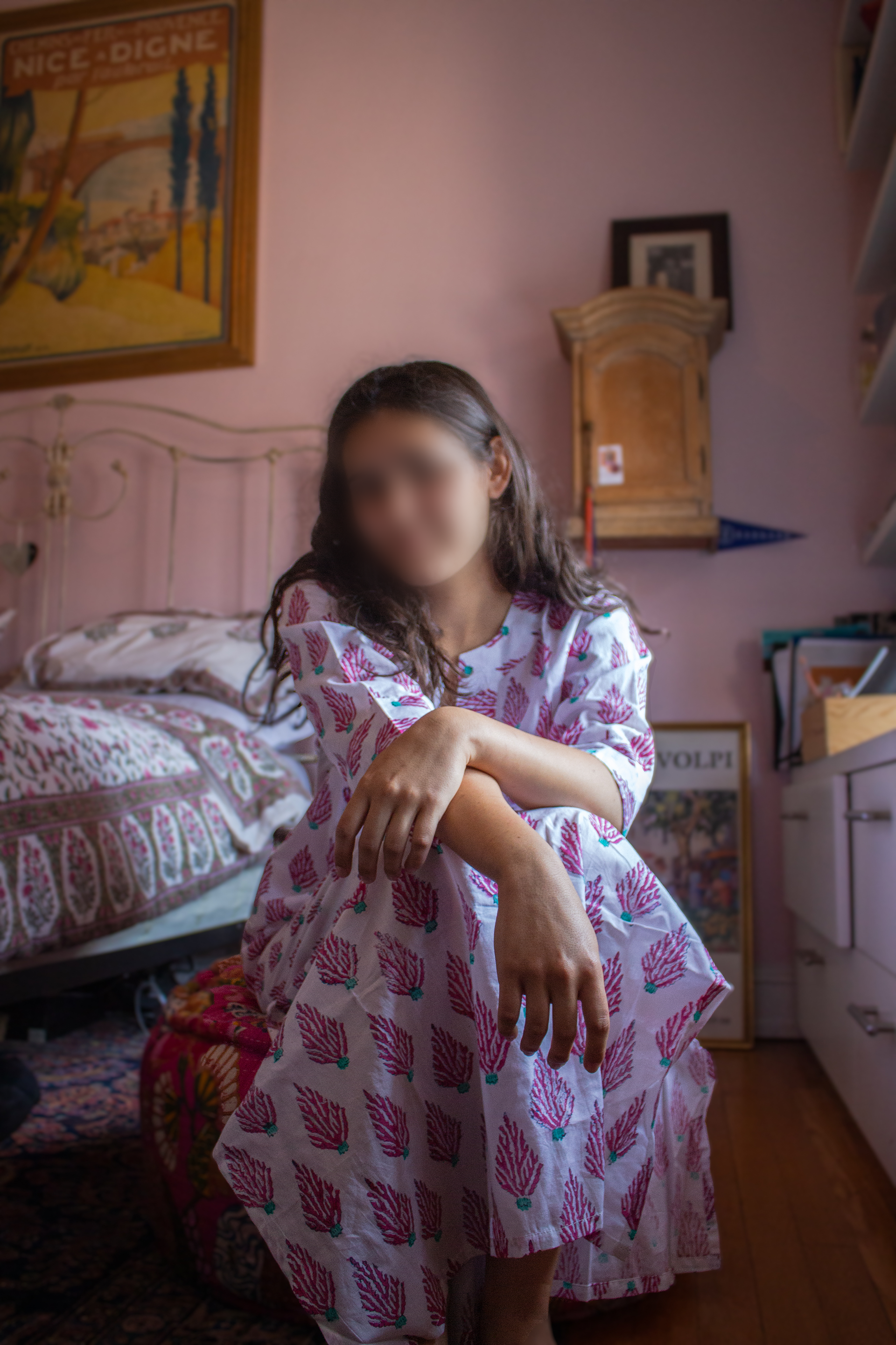 Face Blurred for Model's Privacy