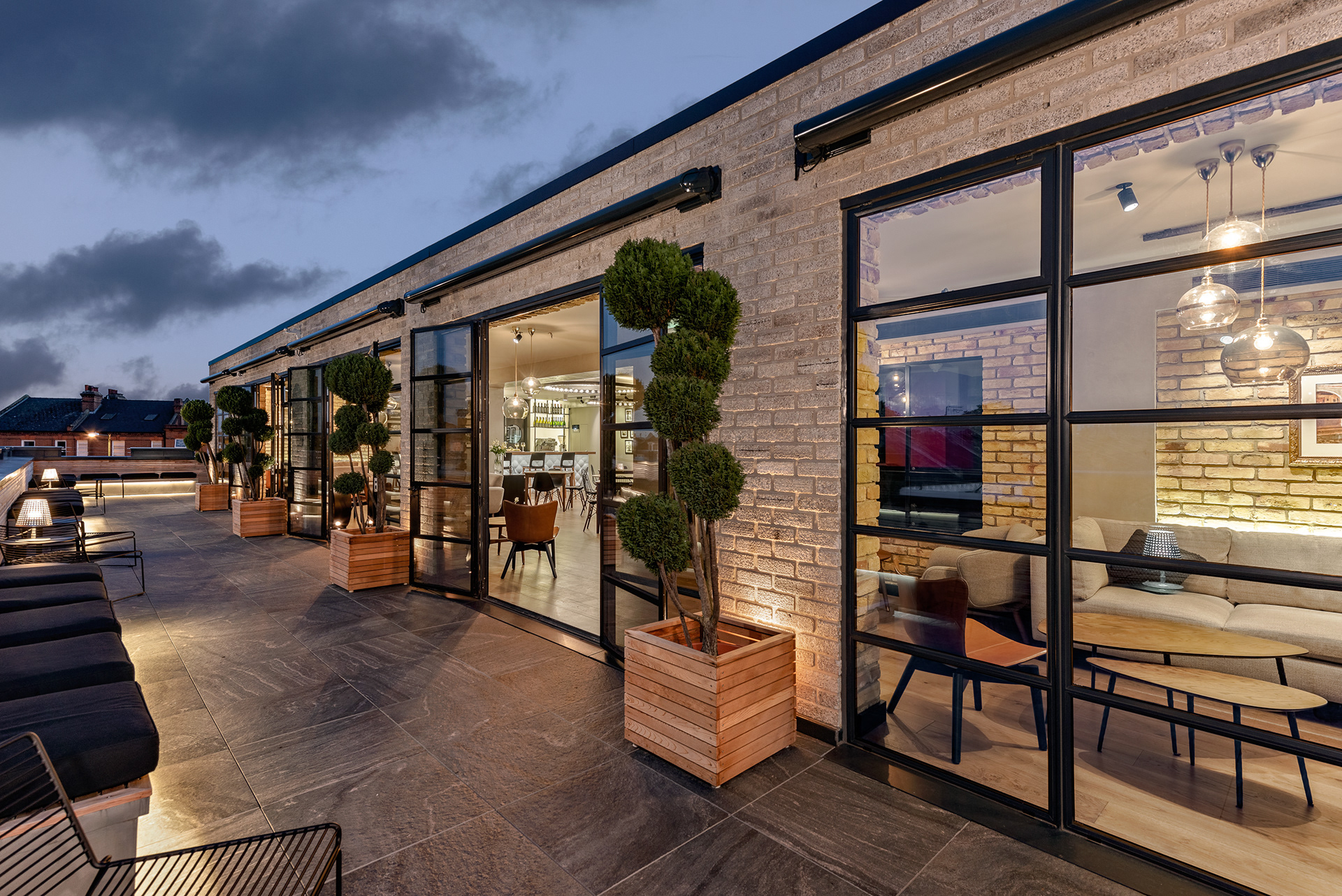Twickenham Film Studios' private members roof bar. Photography by Marcin Noga.