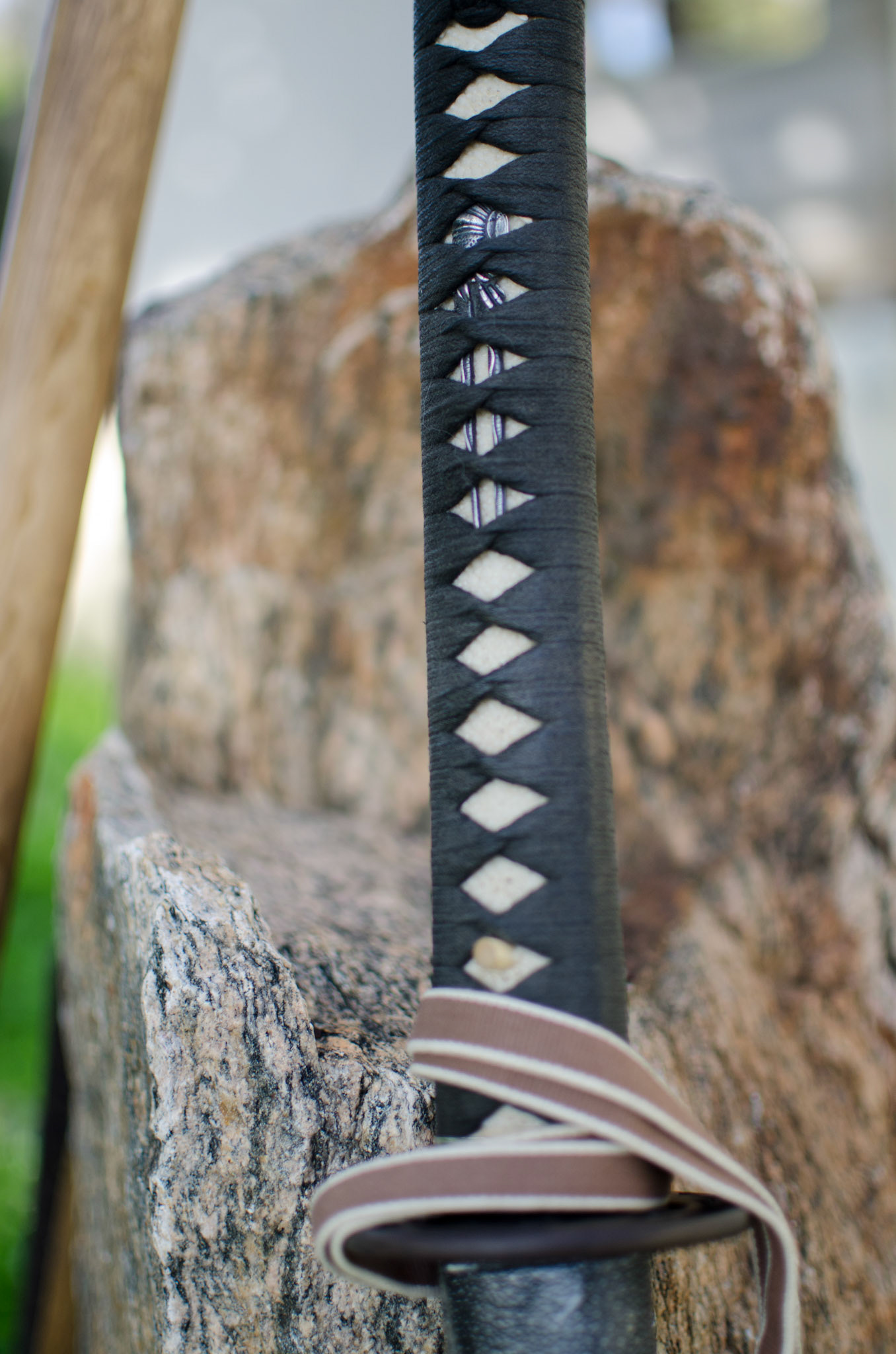 In the back streets of a Fremantle suburb is a Rinzai Zen temple. Converted from a classic 1960's brick and tile house, the Zendo offers meditation, calligraphy, and kobudo. The Kobudo training, particulary in sword, is prominent. Training takes place after a formal Zen meditation session. Detail of the tsuka (handle) and a shin-ken (real - sharp - sword)