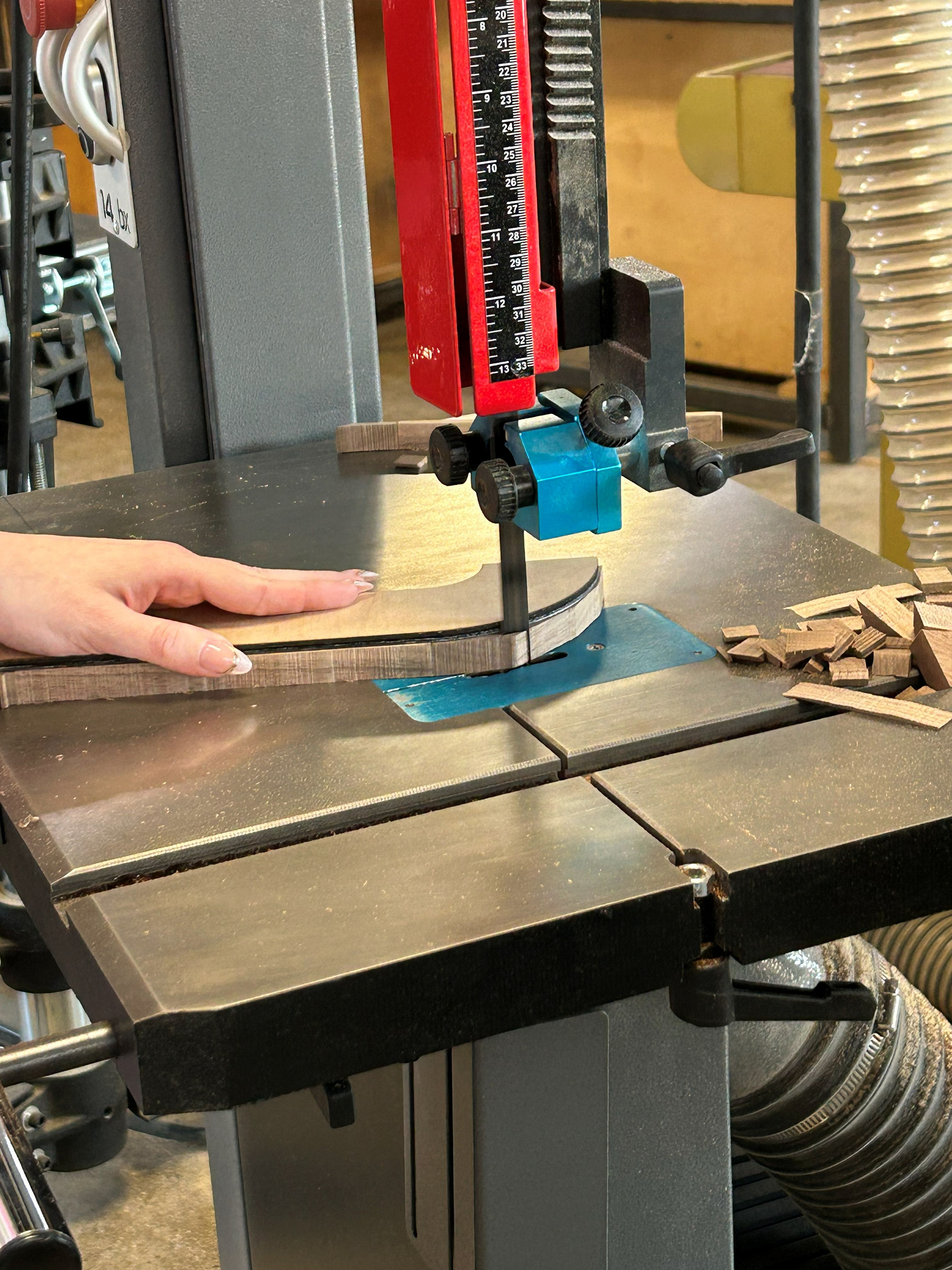 Image 23 | Cutting Out the Official Shape of the S-curve Leg using the Band Saw with the Plywood Template of the S-curve Taped on Top