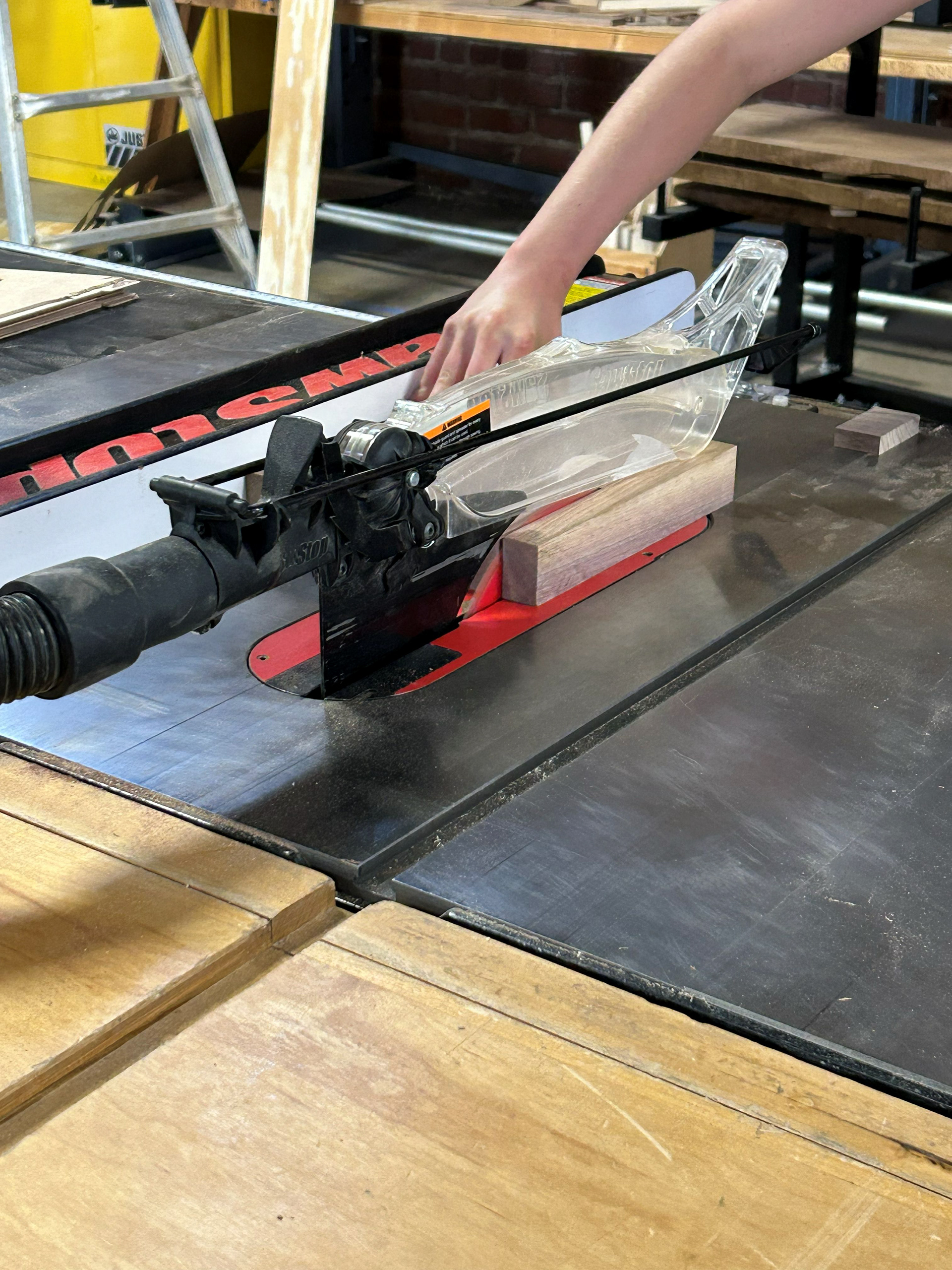 Image 7 | Rip Cutting the 8/4 Boards on the Table Saw, Using the to Measure the Needed Dimension of Each Footstool Piece
