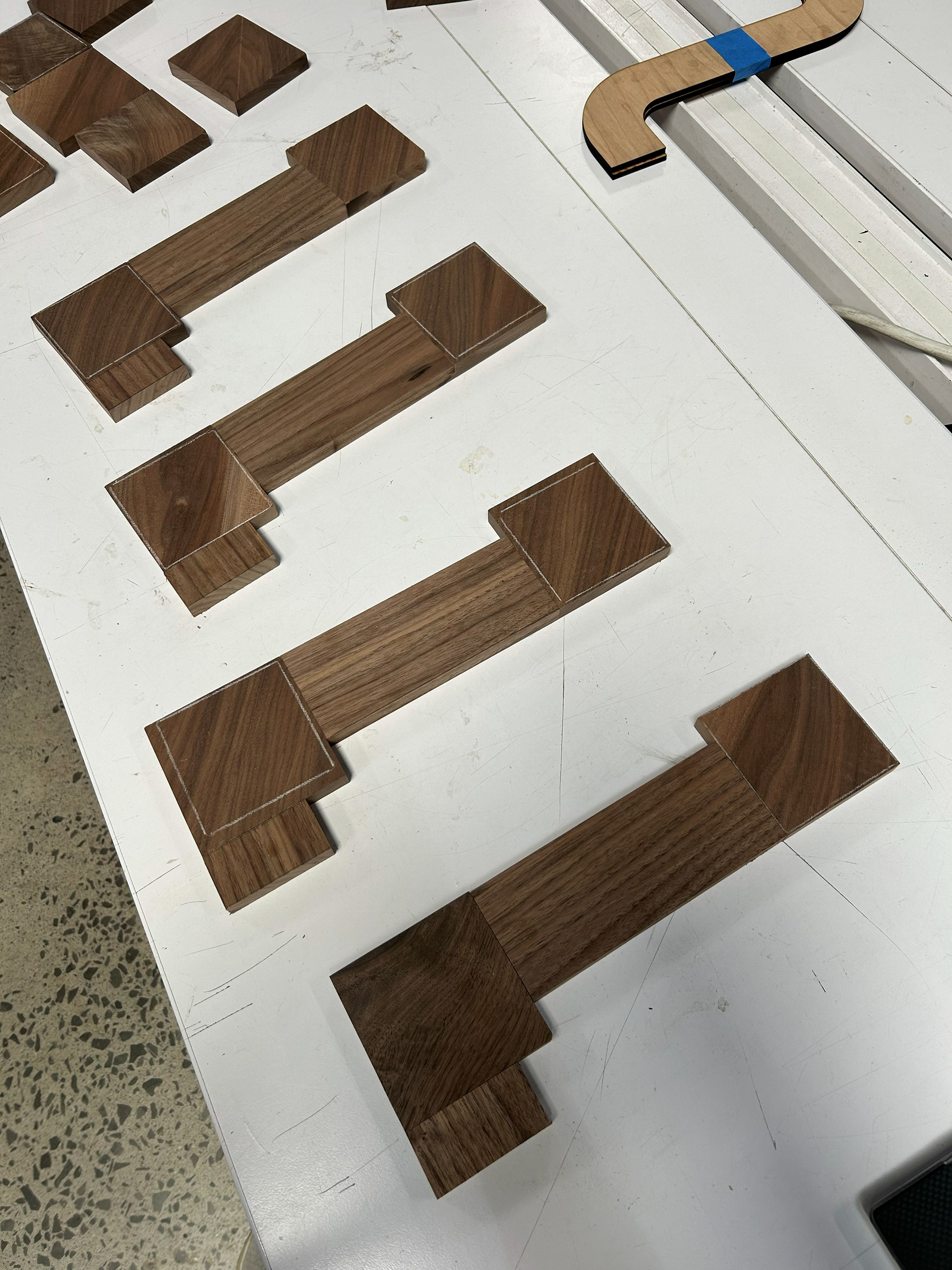 Image 16 | Matching the Shade, Color, and Grain Pattern of the S-curve Square Pieces with the Straight S-curve Pieces to Create Initial S-curve Shape