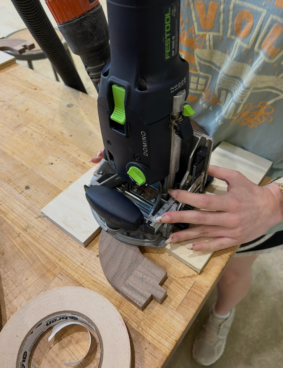 Image 37 | Using the Domino Tool to Cut 4x20 Floating Mortise and Tenon Joints on the Interior Face of Two S-curve Legs per Footstool Assembly