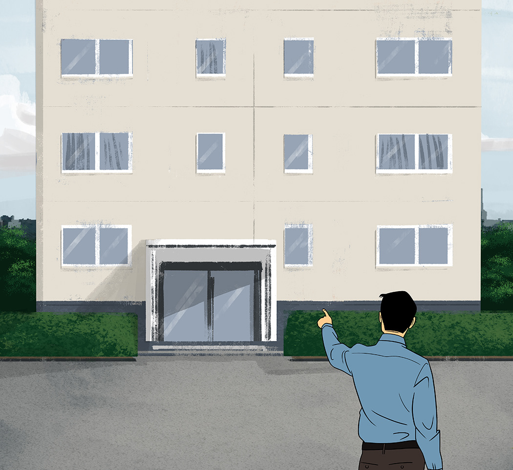 dessin d'un homme pointant du doigt un immeuble