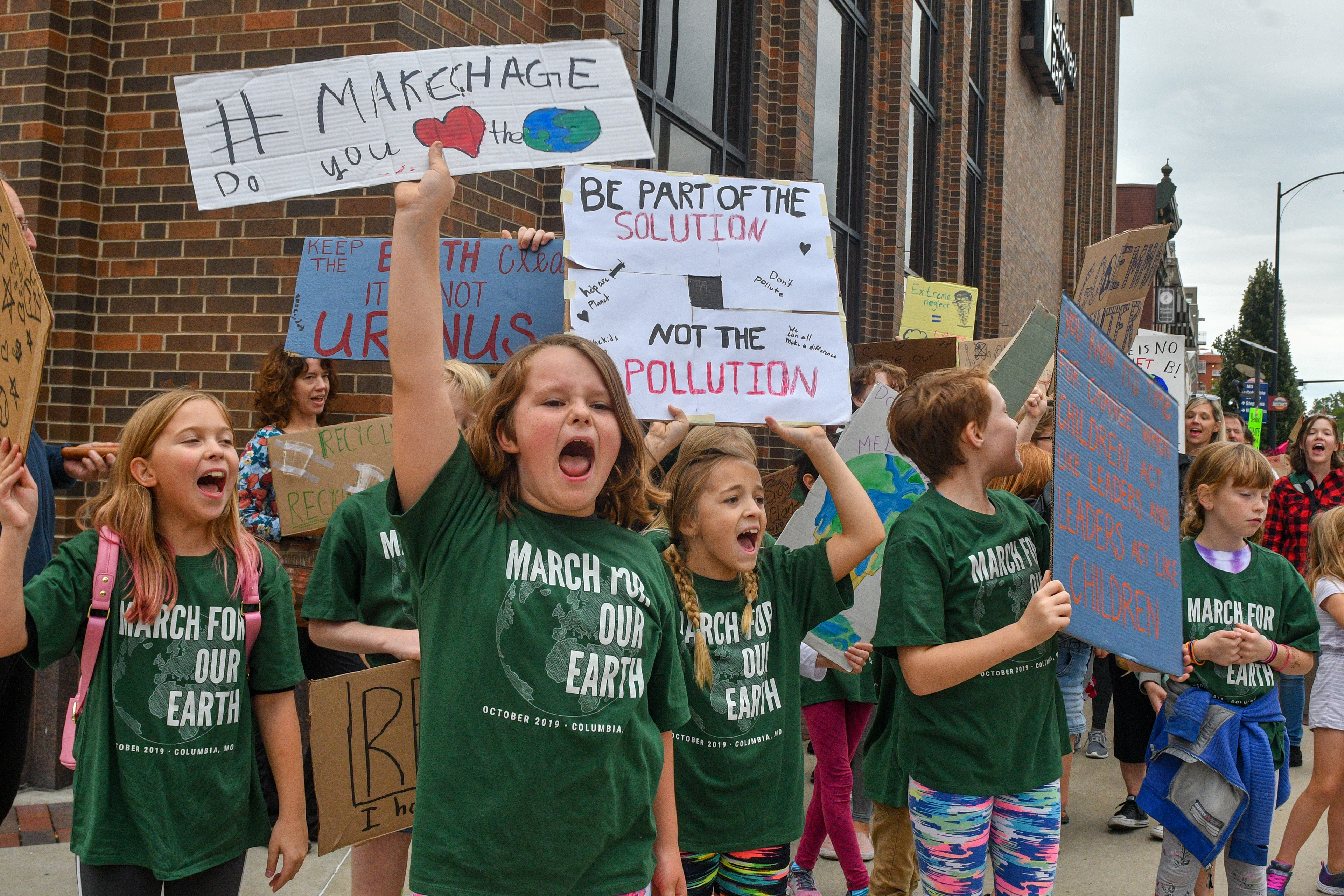 Children demand climate action during the March for Our Earth on Sunday, October 6, 2019 at the Courthouse Plaza in Columbia. The march was organized by 9-year-old Emma Winter.