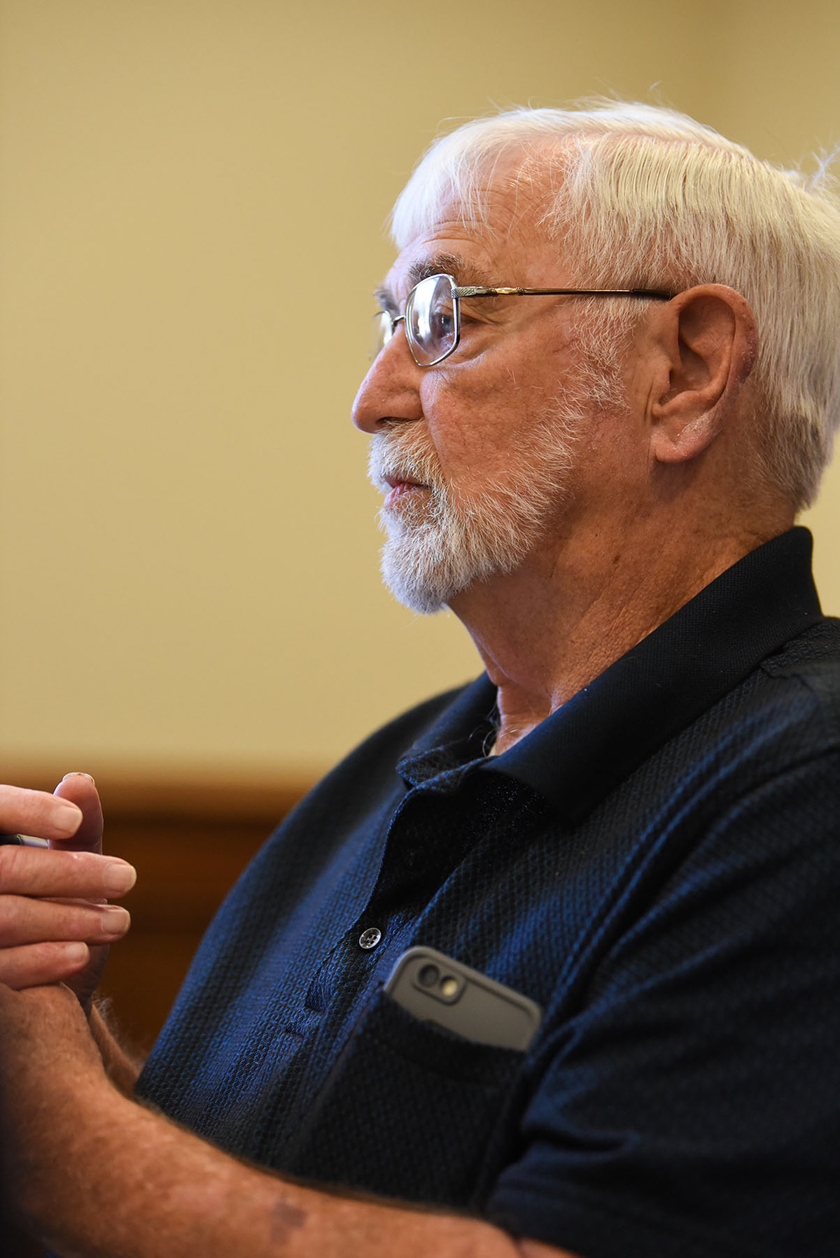 District 1 Supervisor Harry Sanders listens as Bishop Scott Volland asks the county to consider removing a Confederate monument from the courthouse lawn during a board of supervisors meeting on Monday at the Lowndes County Courthouse. Sanders proposed that instead of relocating the statue, they compromise by adding onto the monument to address slavery. Later, Volland said that what Sanders didn’t realize is that relocating the statue already was compromising.