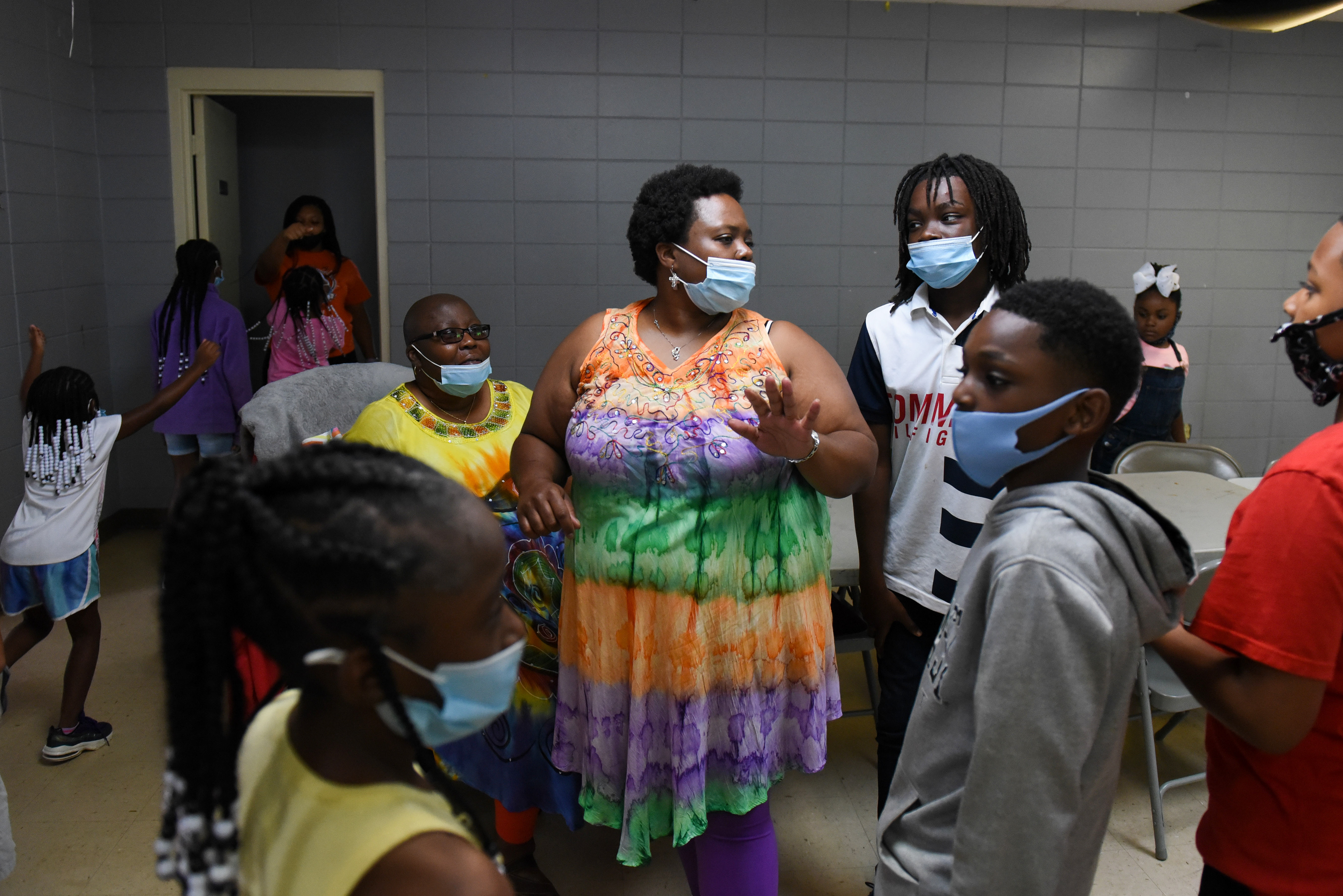 Niya Smith talks with Kylin Boyd, 12, while students get up for a bathroom break during Ms. Smith’s Academic Summer Camp on July 16 at the Needmore Center in Starkville. Kids who enroll in Ms. Smith’s summer camp or after school program usually use the educational services for five to nine years. “It’s really awesome to watch these kids grow,” Niya Smith said of how she gets to be part of their lives beyond camp.