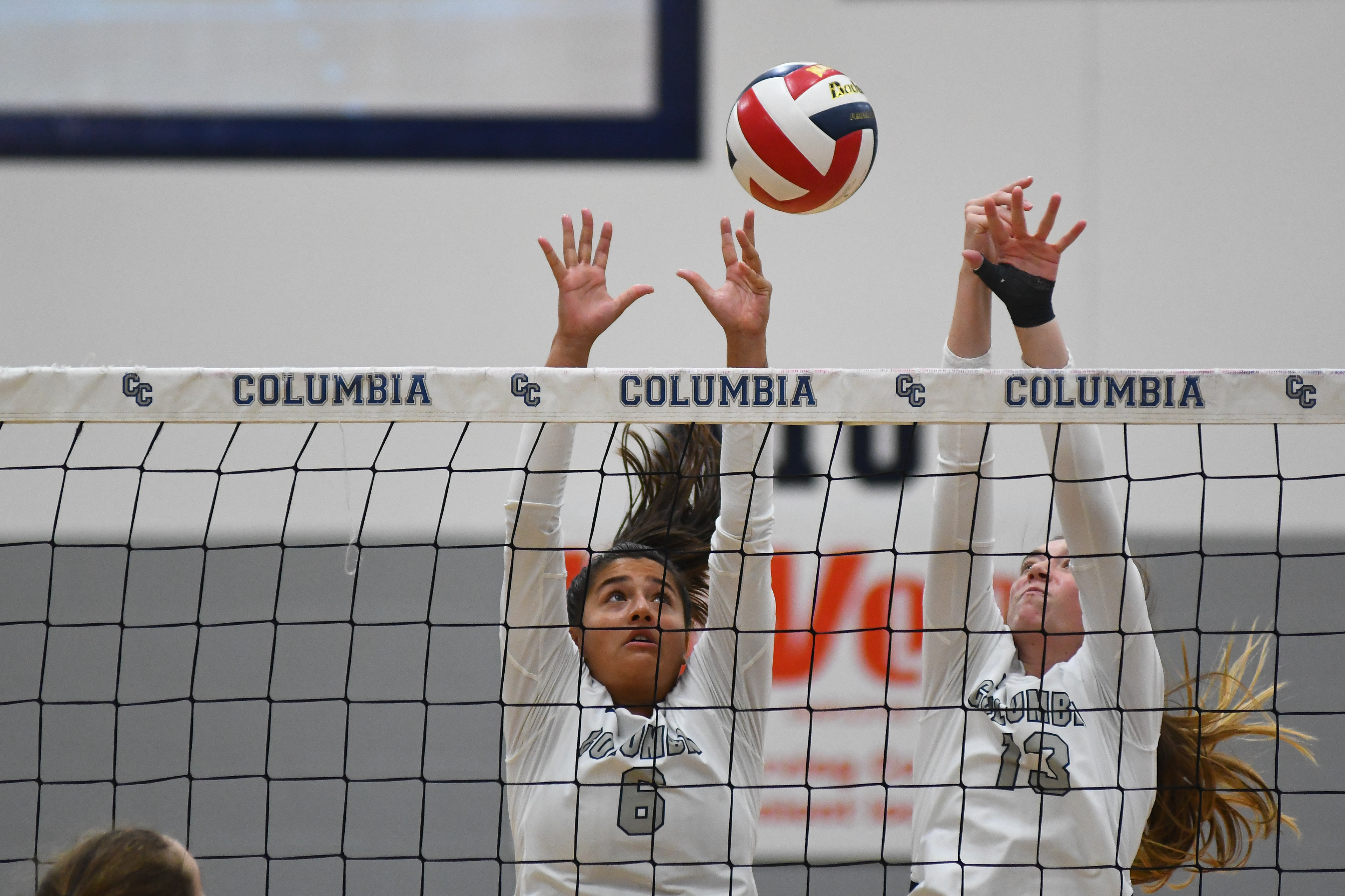 From left, Luisa Ferreira and Bailee Ulrey attempt to block the ball at a Columbia College volleyball game on Thursday, Oct. 3, 2019 at Southwell Complex in Columbia. Columbia College's season overall is 16-2 and its conference overall is 4-0.