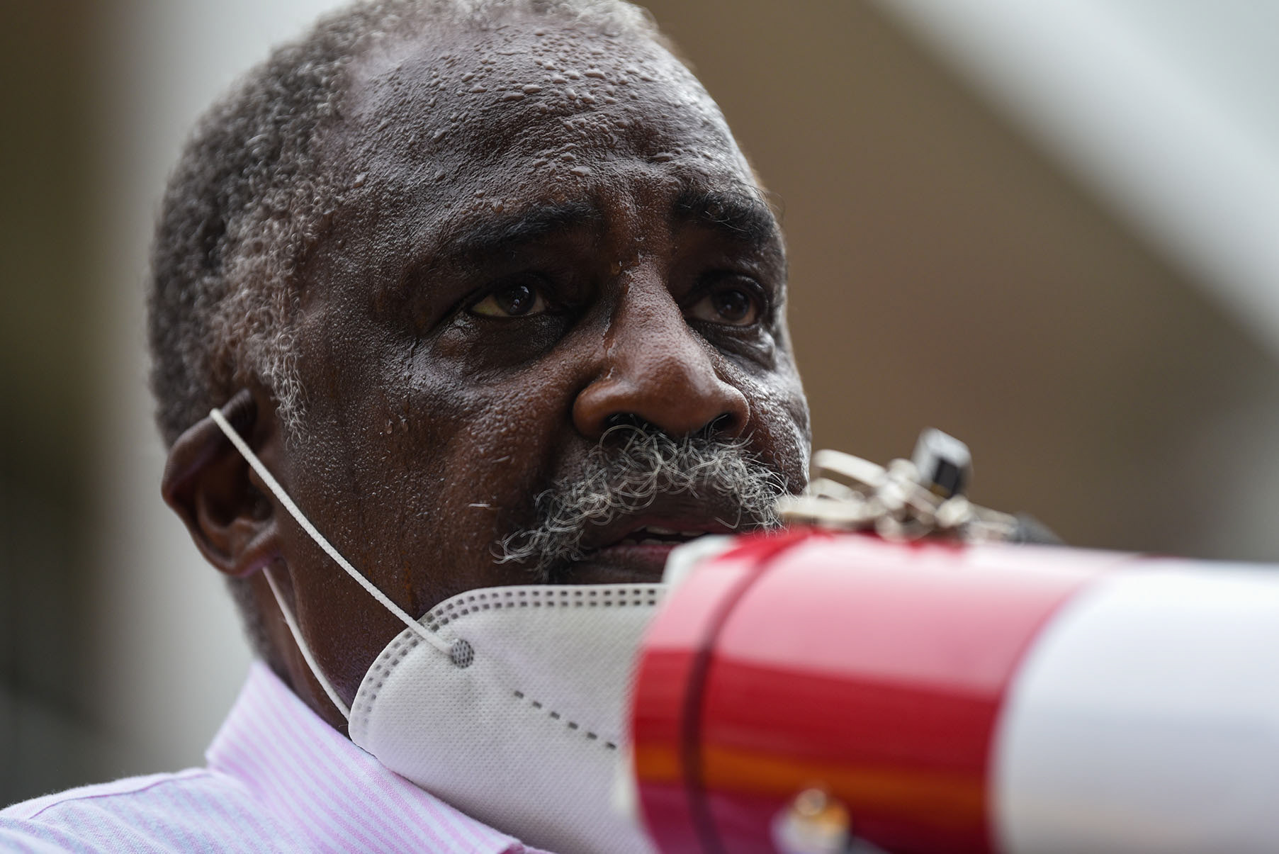Sweat pours down District 5 Supervisor Leroy Brooks’ face during a protest demanding District 1 Supervisor Harry Sanders’s resignation on Tuesday, June 30 outside the Lowndes County Courthouse. “We will live as one community or we will perish as two, but we’re not scared,” Brooks said in his speech to the crowd after the meeting.