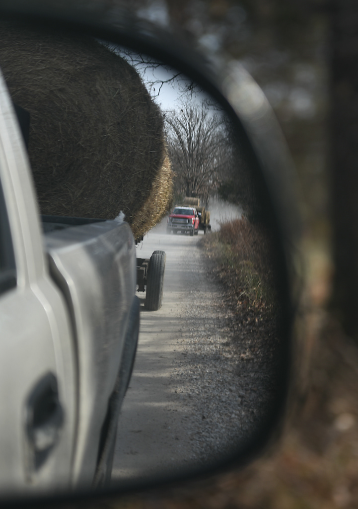 Scott Wehrle drives his truck behind his father Steve Wehrle’s truck Sunday, December 8, 2019. The Wehrle’s moved bales of hay from one plot of land to the plot where their cows are kept.