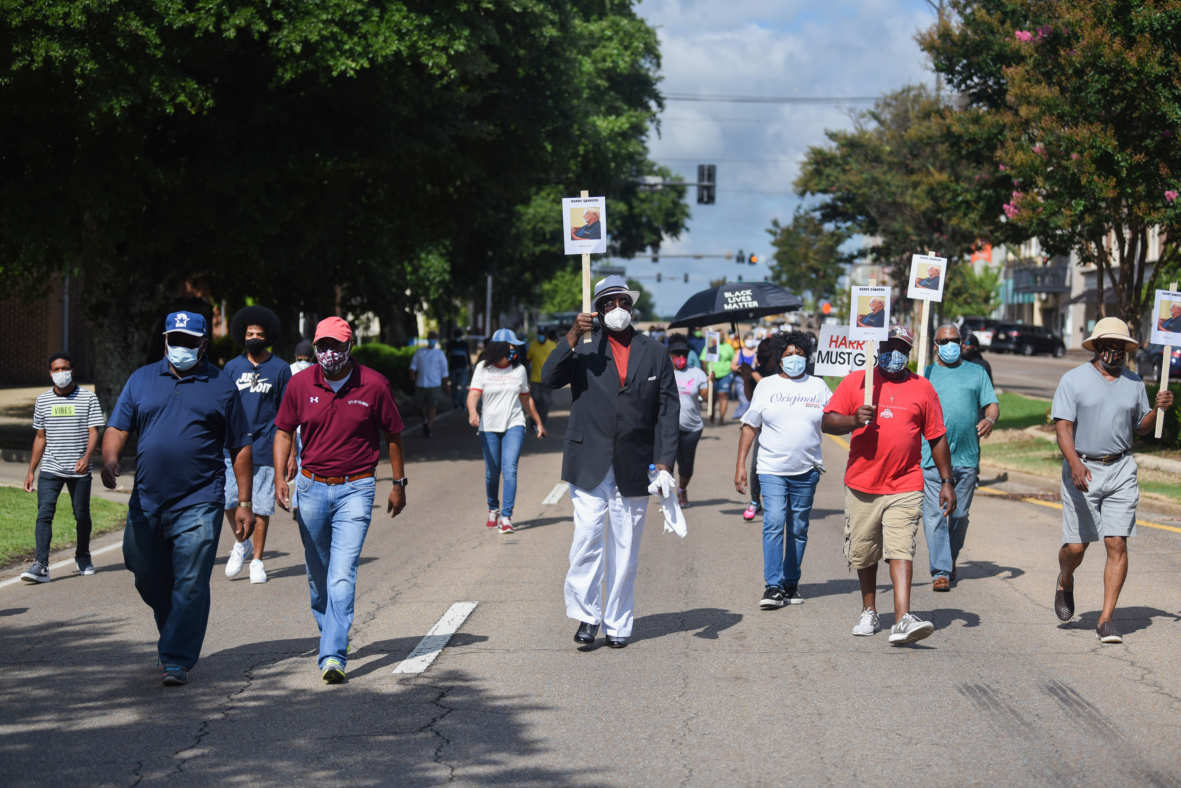 Protesters march through the streets during the Equality and Justice March on Saturday, August 1 in Columbus. About 60 people gathered to continue to demand Lowndes County District 1 Supervisor Harry Sanders’ resignation in response to racist remarks he made on June 15 after a supervisors meeting.