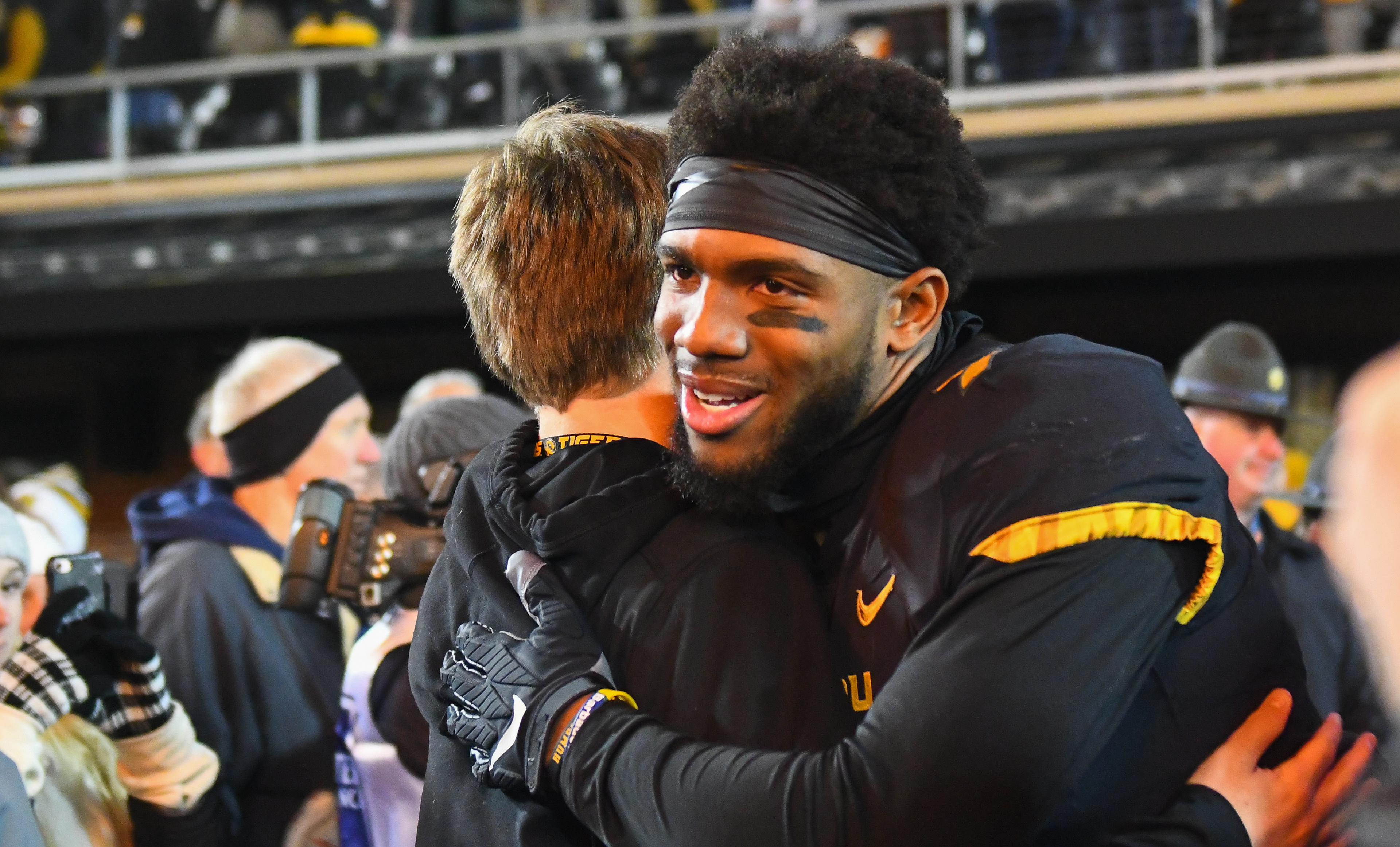Missouri quarterback Kelly Bryant hugs a fan prior to being introduced on senior night Saturday, November 23, 2019 on Faurot Field.