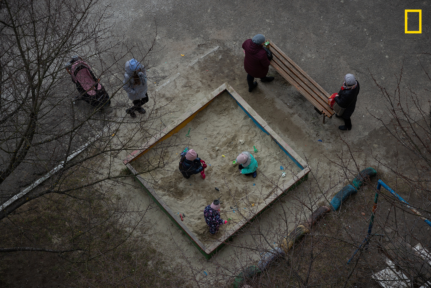 Children in the small town of Lviv region, in the west of the country, play in the sandbox next to their parents during a brief break between rocket alarms on the sixth day of the war. March was the deadliest month of the war for Ukrainian civilians, the Office of the UN High Commissioner for Human Rights (OHCHR) recorded 4,196 civilian deaths and 3,010 civilian injuries, with the real number believed to be much higher, especially in March due to difficulties in verifying the data.