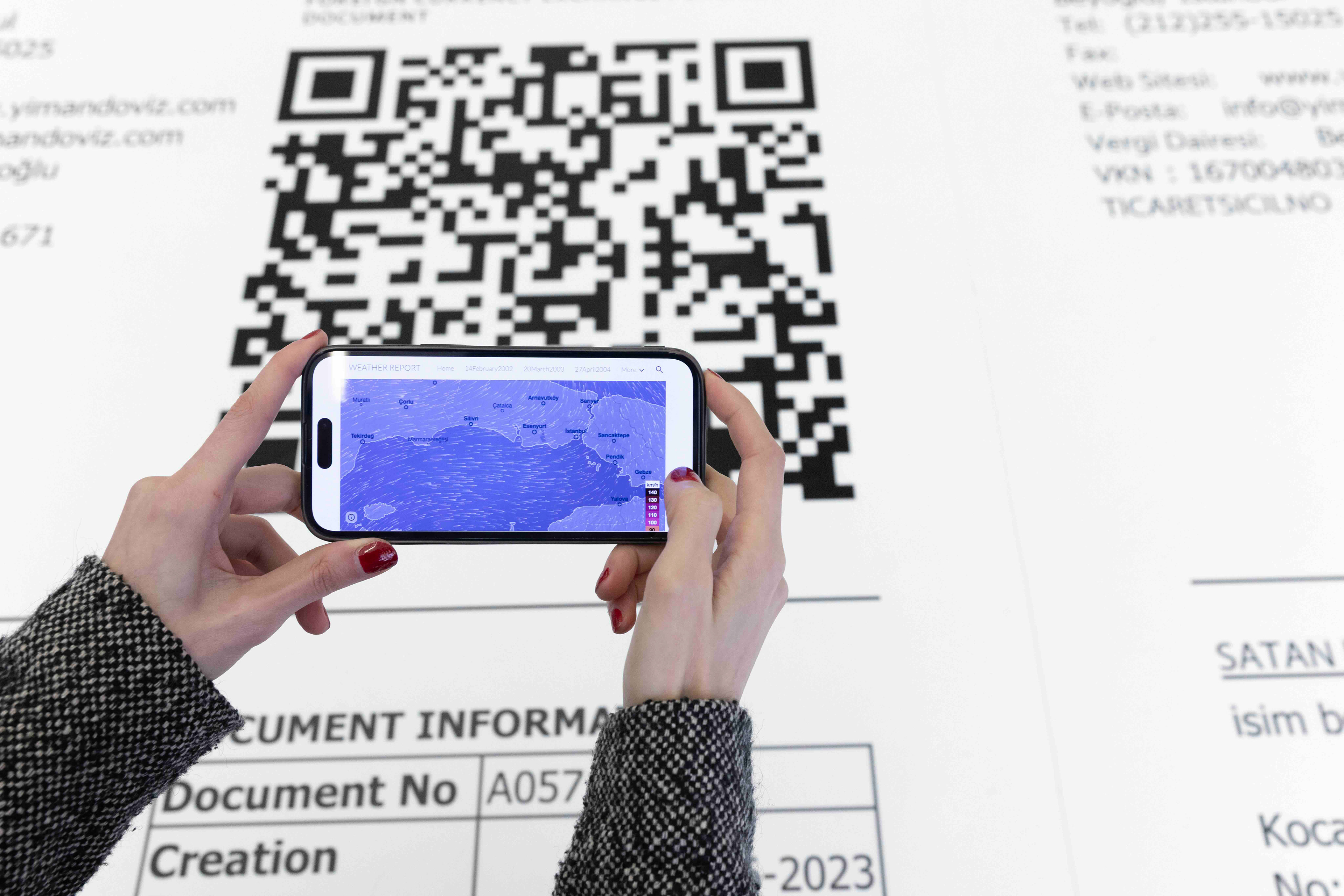 Justice & Development Party / Weather Report, 2026 Installation with enlarged financial receipts and QR-linked historical weather data