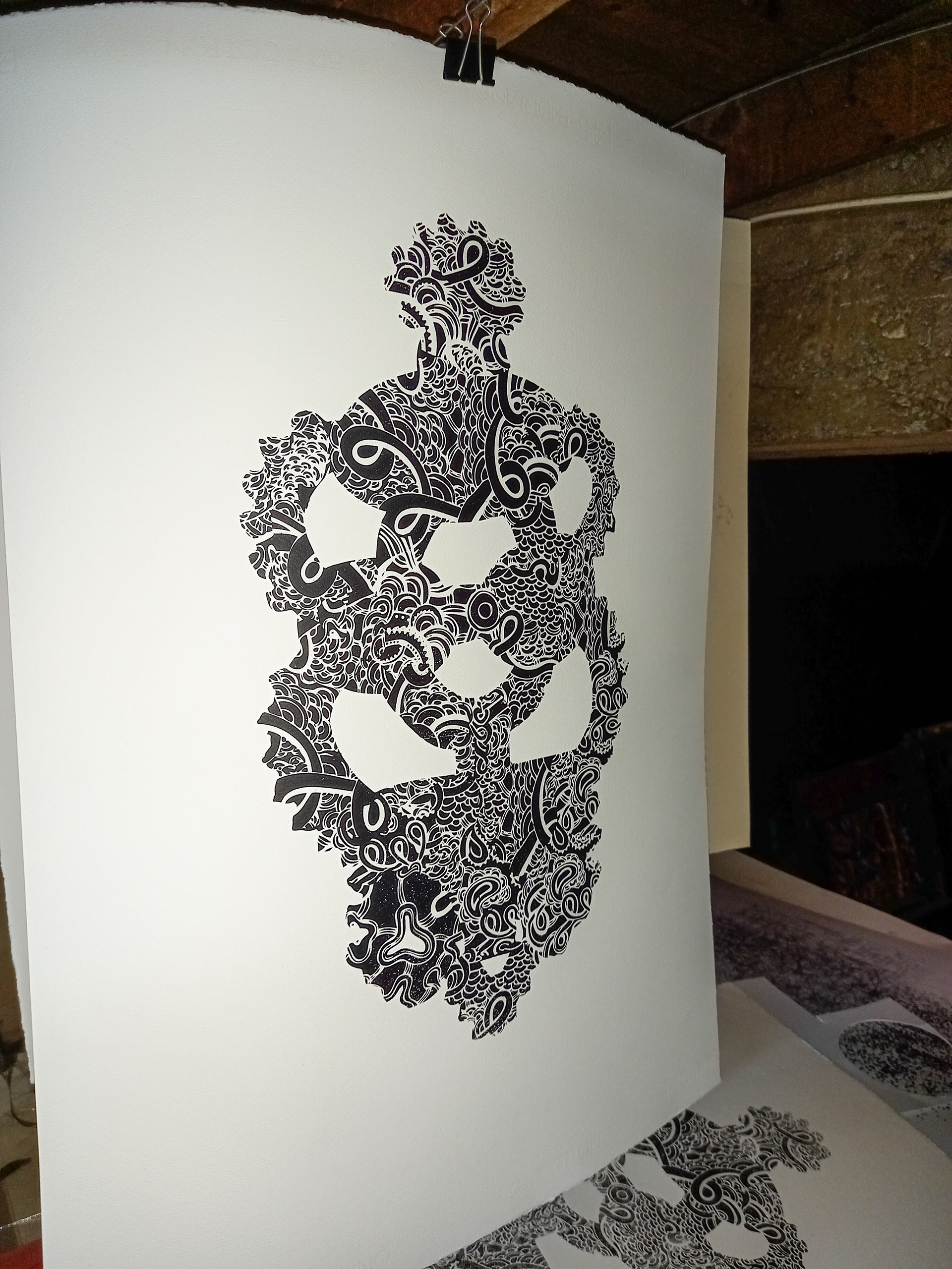 A print hanging out to dry