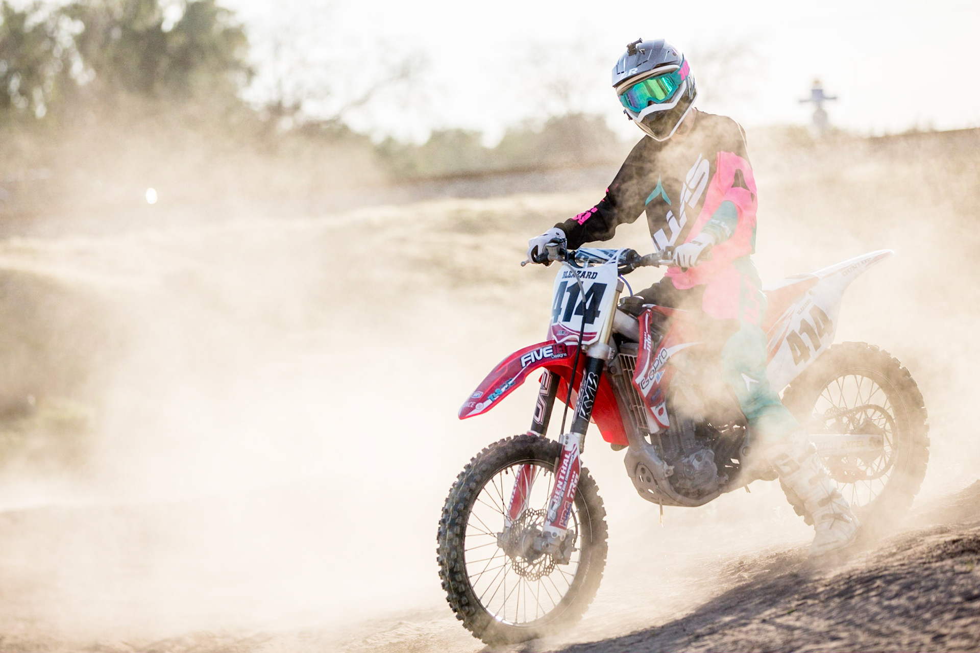 Cade's high school senior portrait by Jared Platt includes studio portraits, long board skating shots and even shots of him on his motor bike on the motorcross tracks.