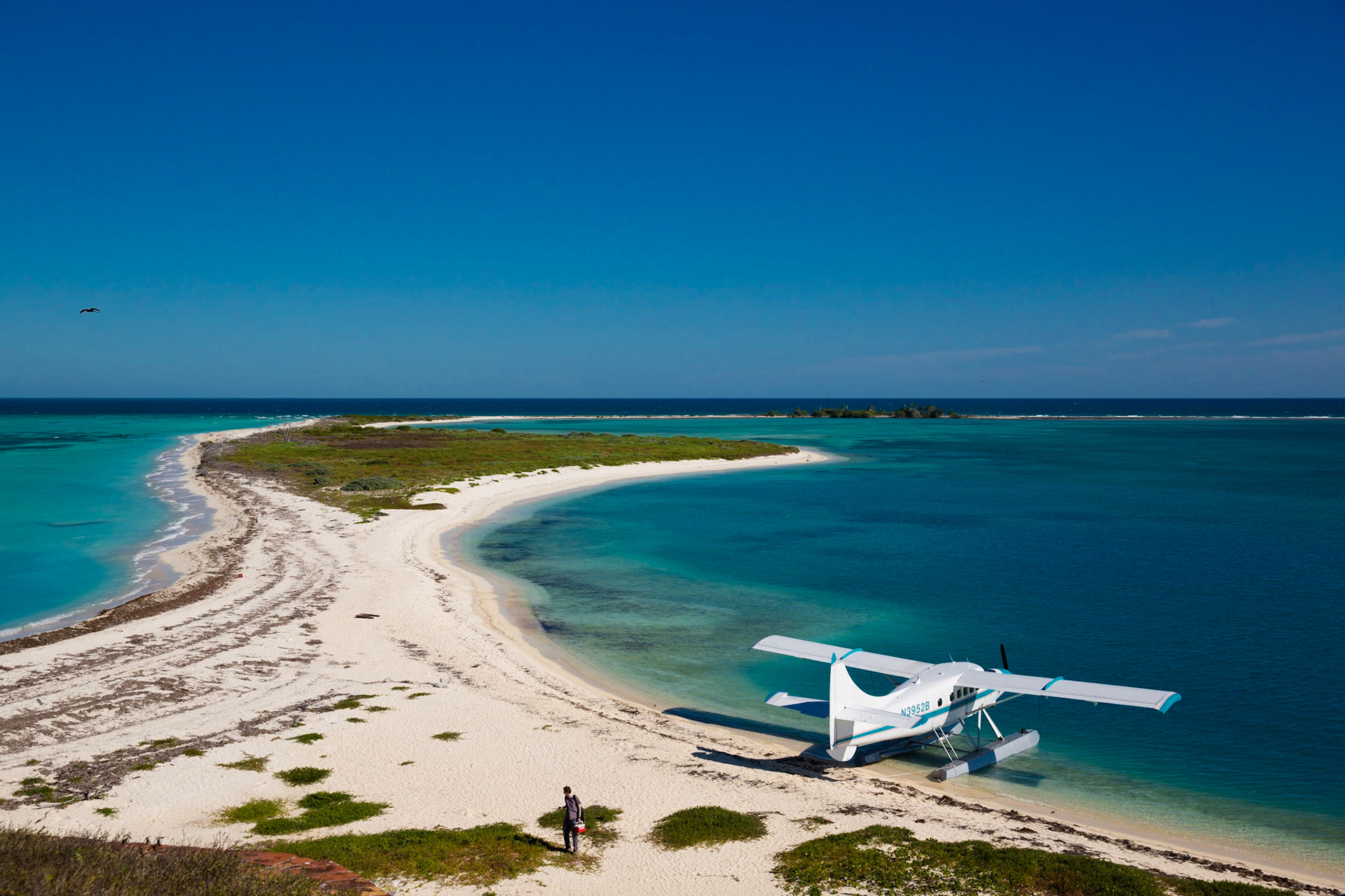 Off the coast of Key West, Florida are the Dry Tortugas where we photographed these adventure engagement portraits. Photography by Jared Platt, Platt Photography.