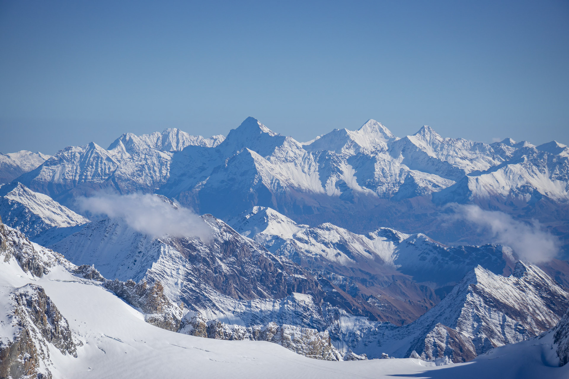 Atop the Aiguille du Midi looking into Switzerland