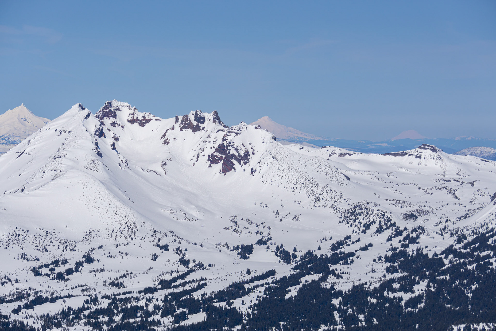 Broken top with Mt. Jefferon, Mt. Hood, and Mt. Adams in the distance