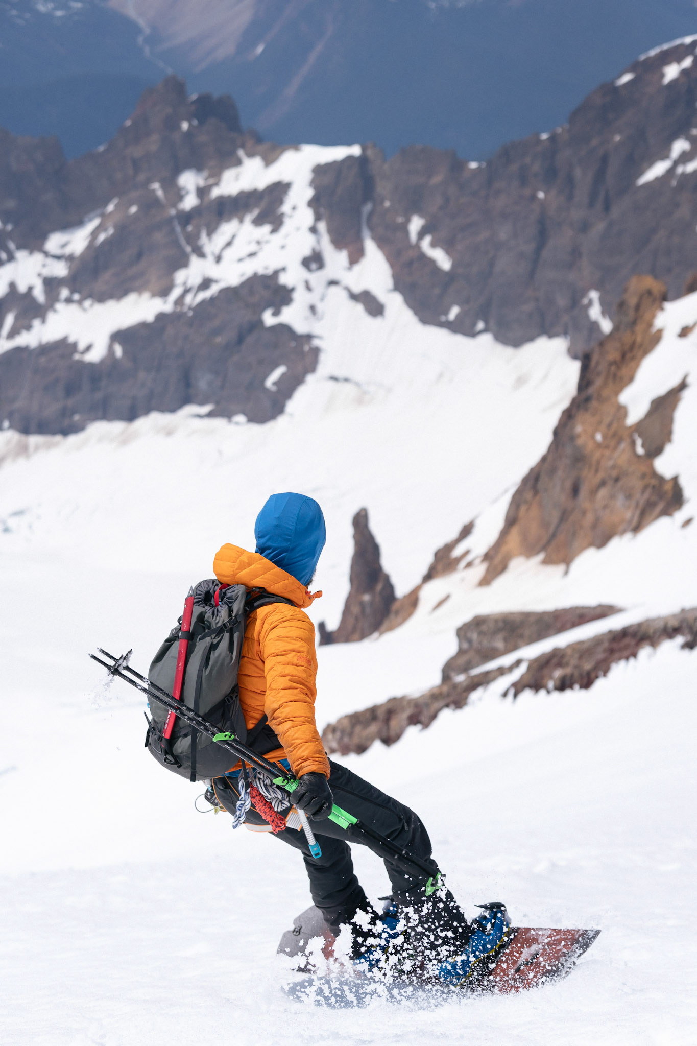 Michael snowboarding down Mt. Baker