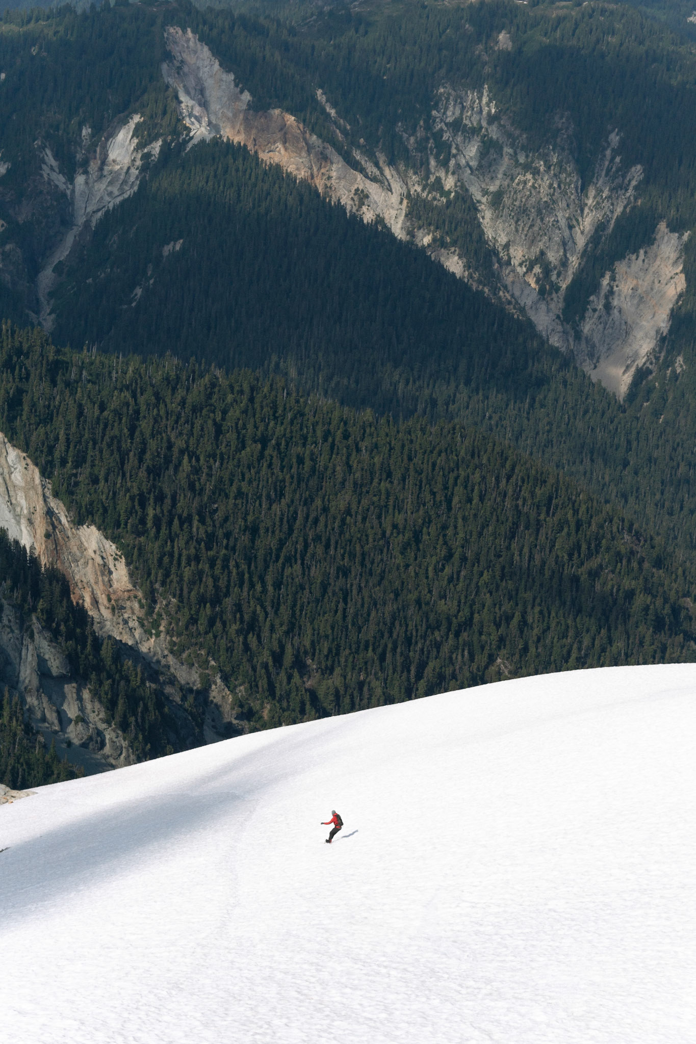 Ryan snowboarding down Ruth Mountain